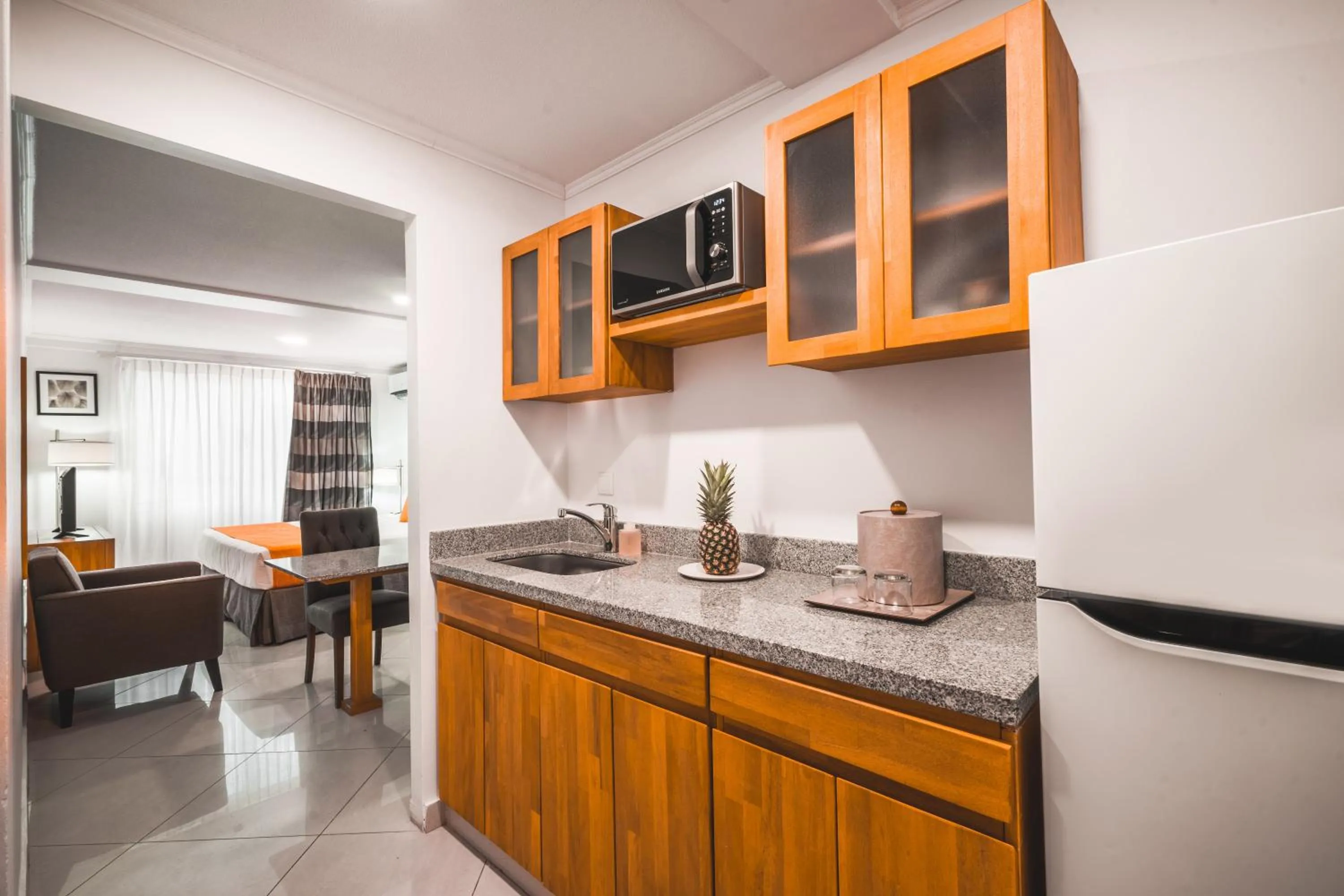 Kitchen or kitchenette in Majestic City Suites & Beach Hotel
