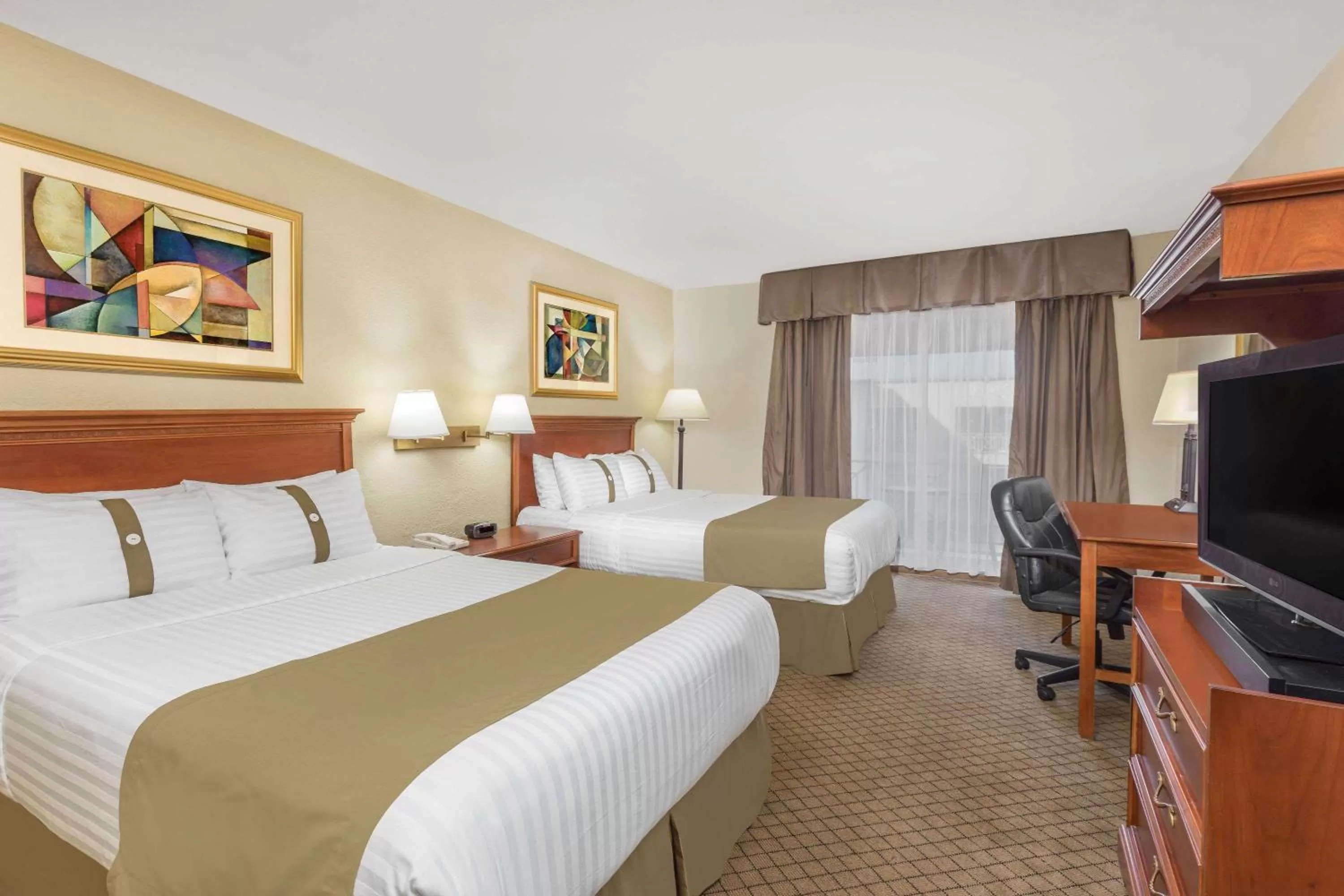 Photo of the whole room, Bed in Wyndham Garden Obregon