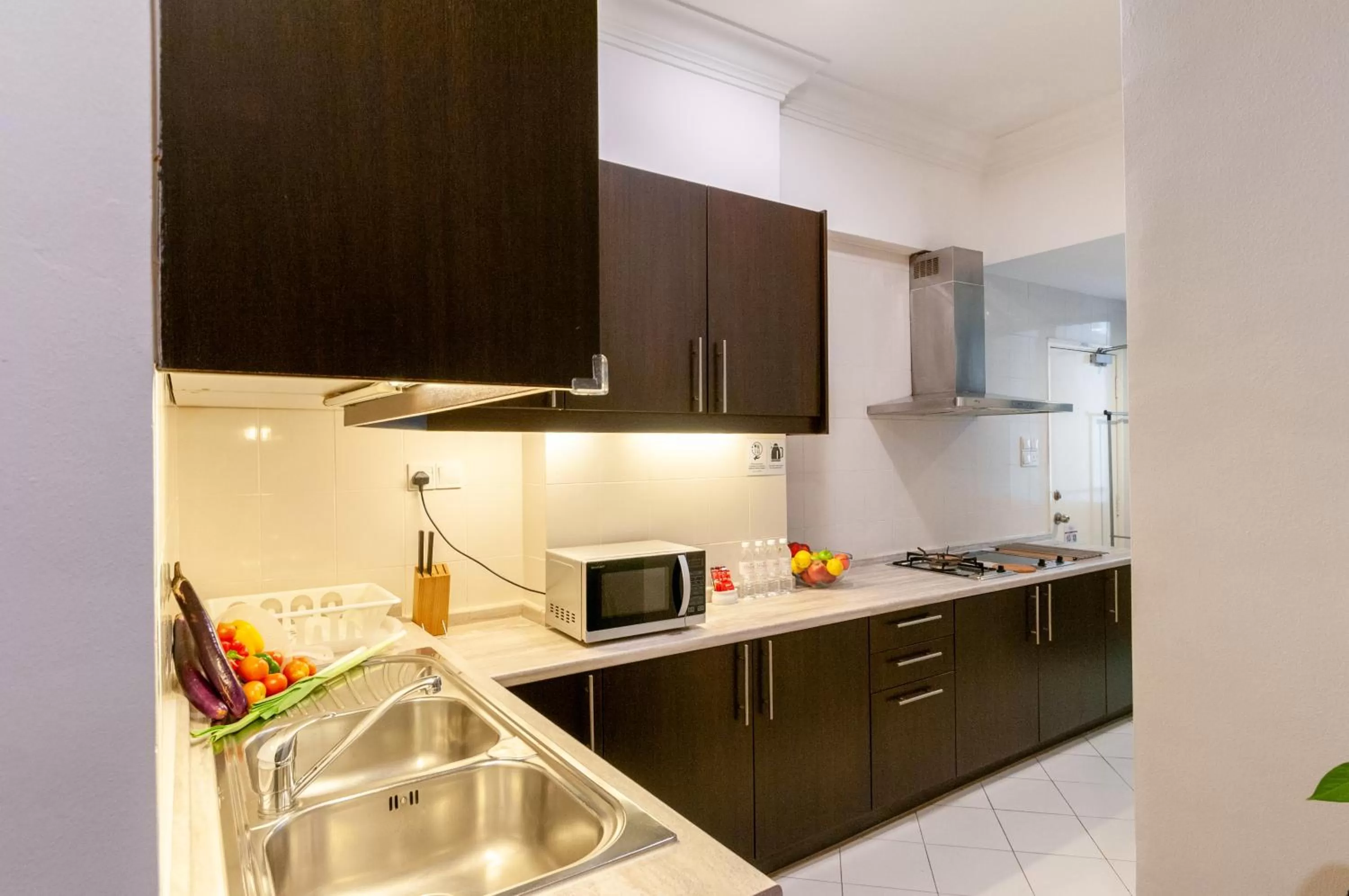 Kitchen or kitchenette in Wedgewood Residences