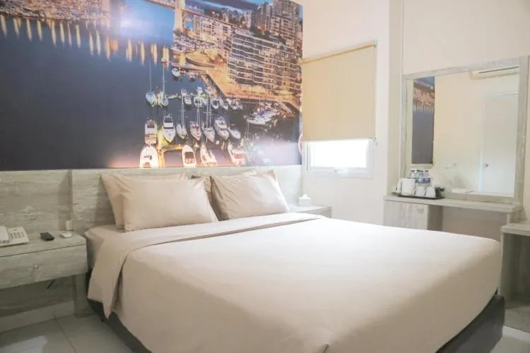 Bed in De Green Inn at Aeropolis