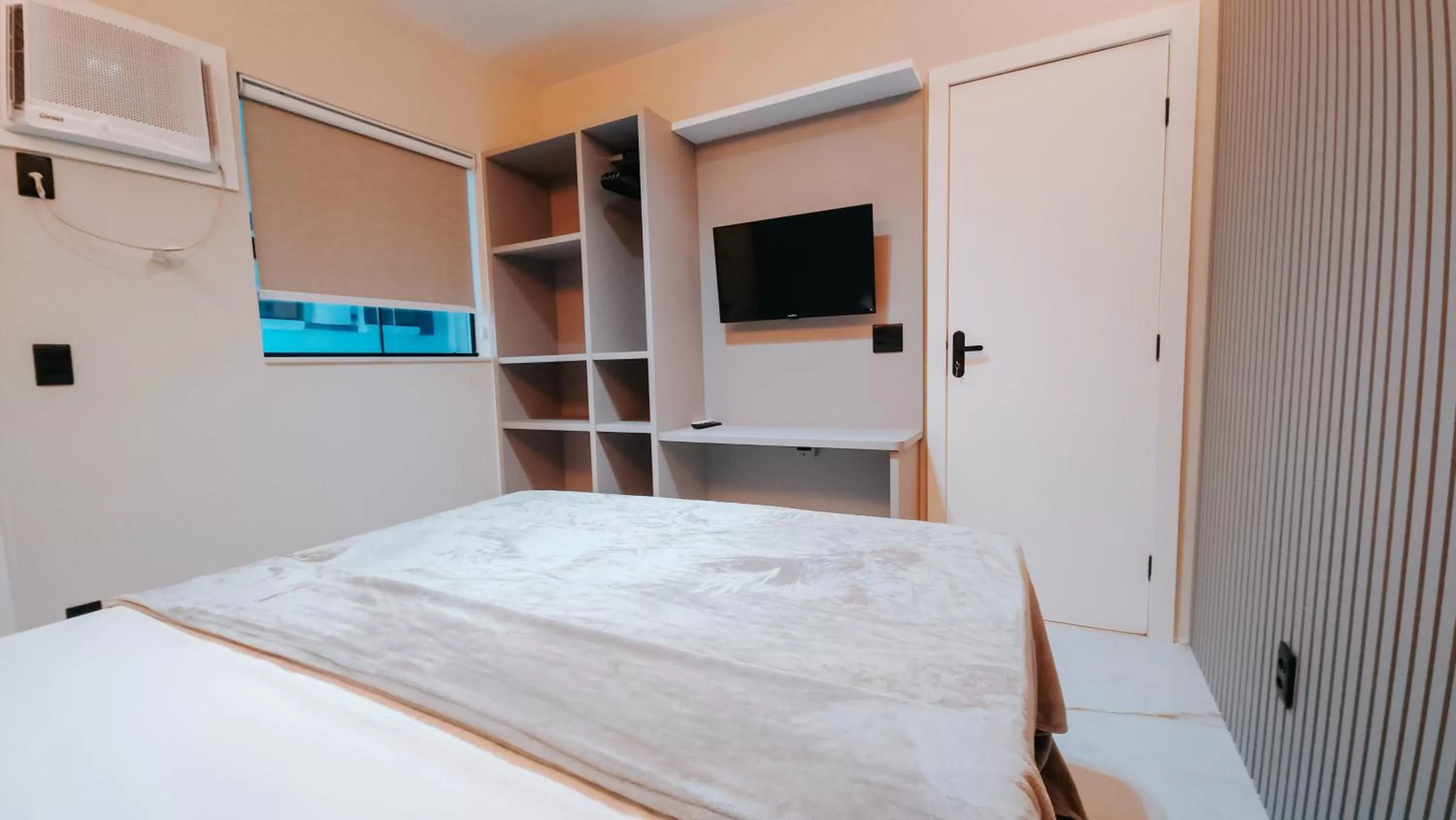 Photo of the whole room, Bed in Suítes Água Marinha