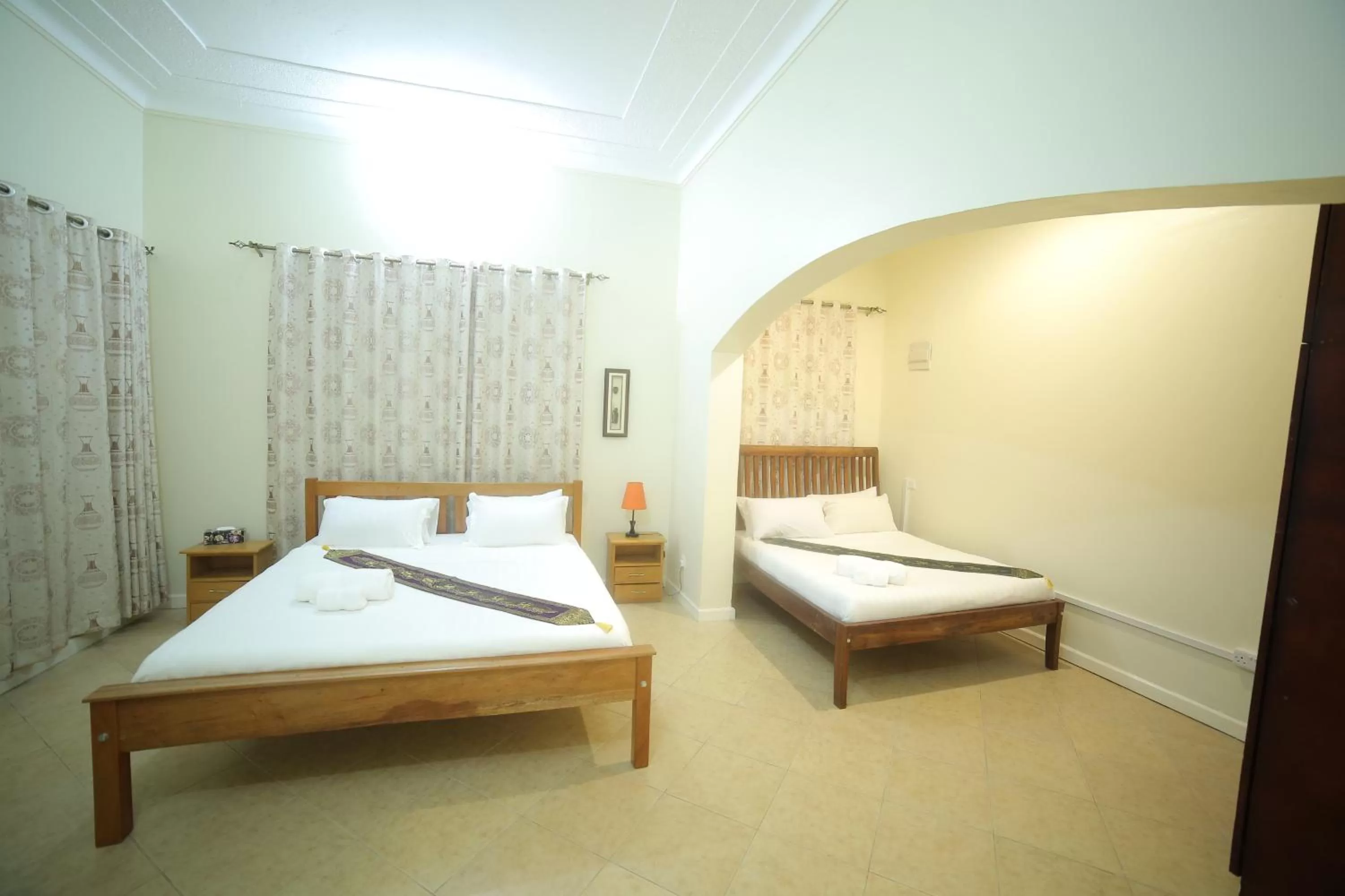 Bed in Entebbe Palm Hotel