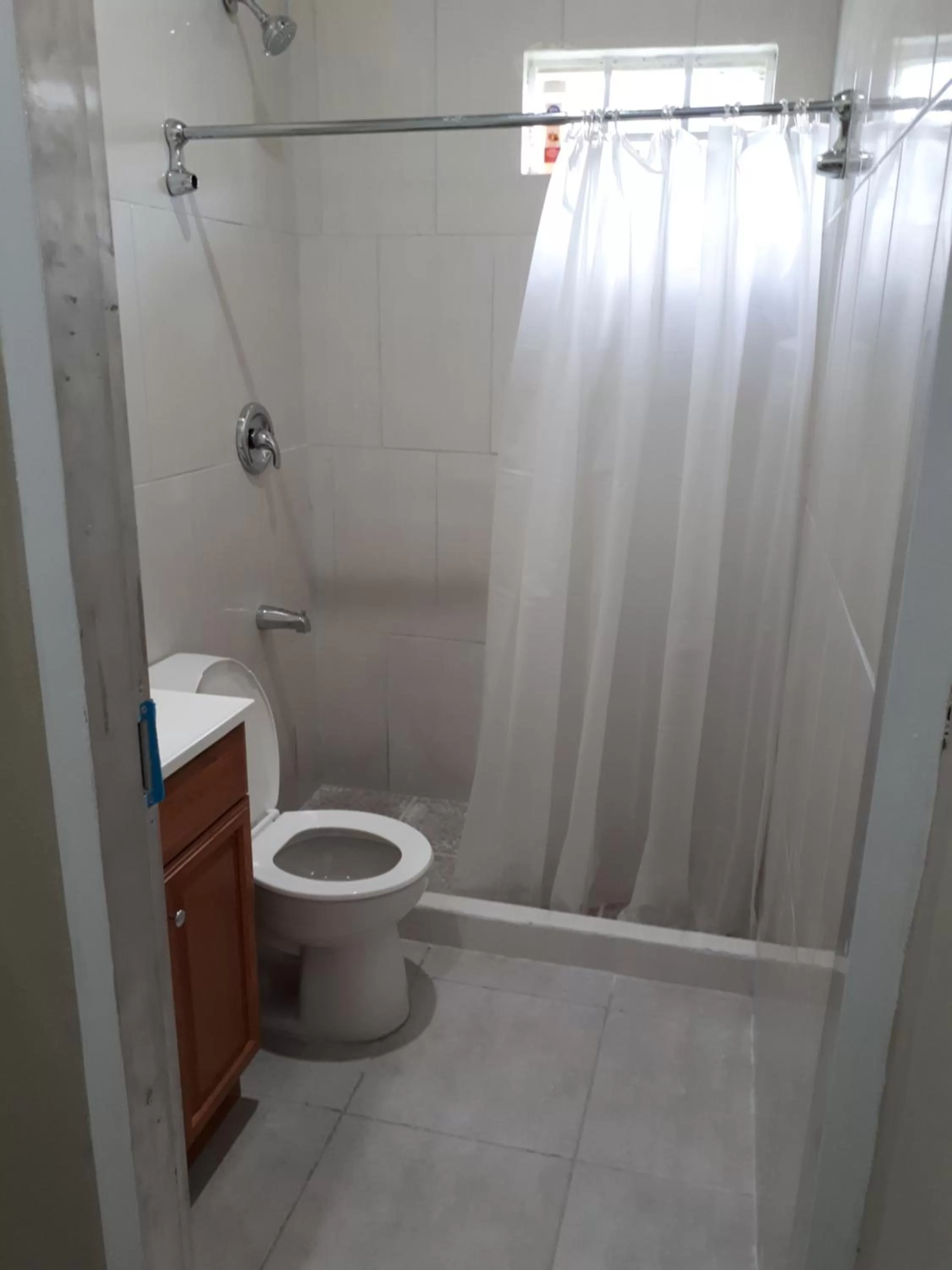 Shower in Woodbrook on the Avenue