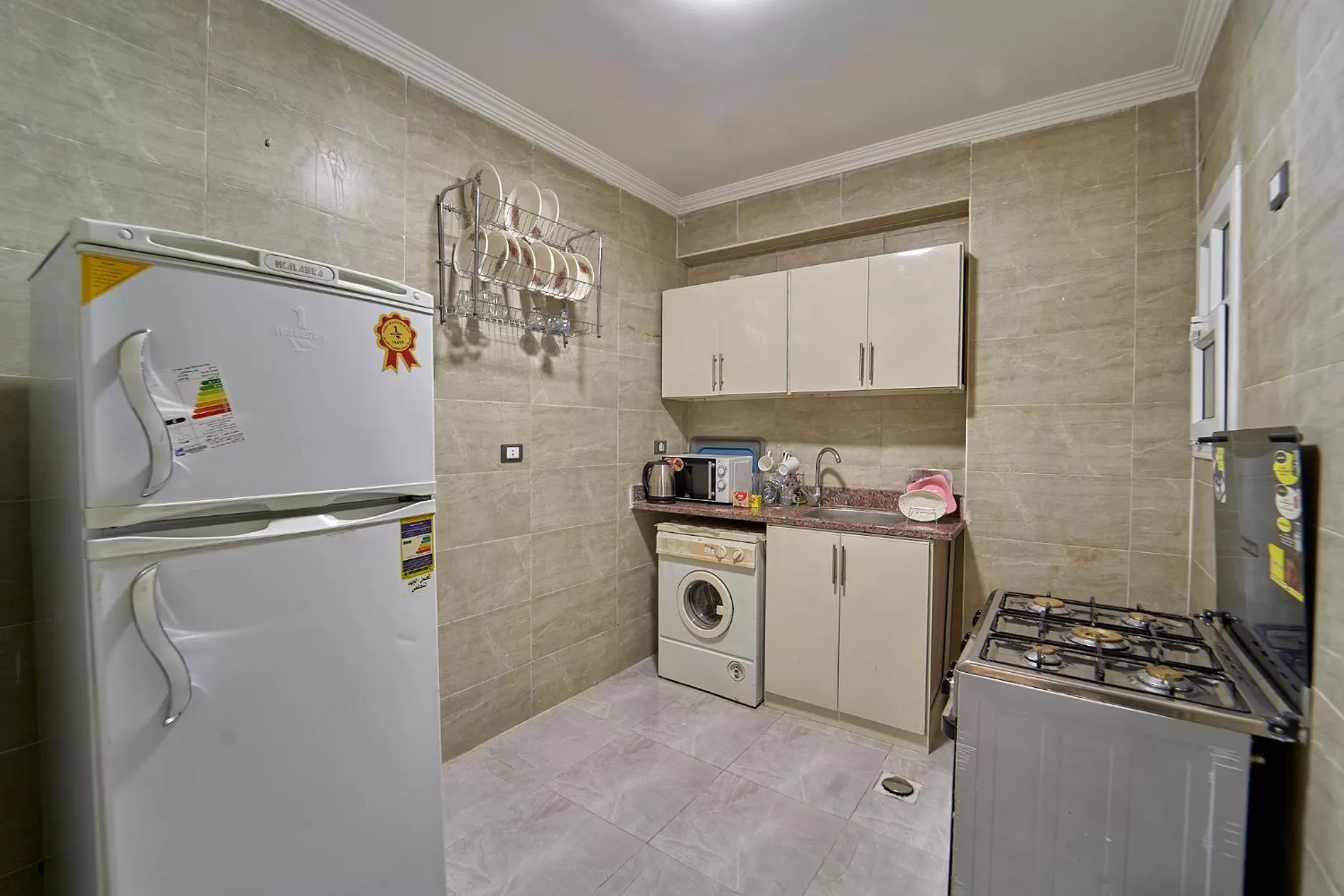 Kitchen or kitchenette in Gardenia Inn Hotel