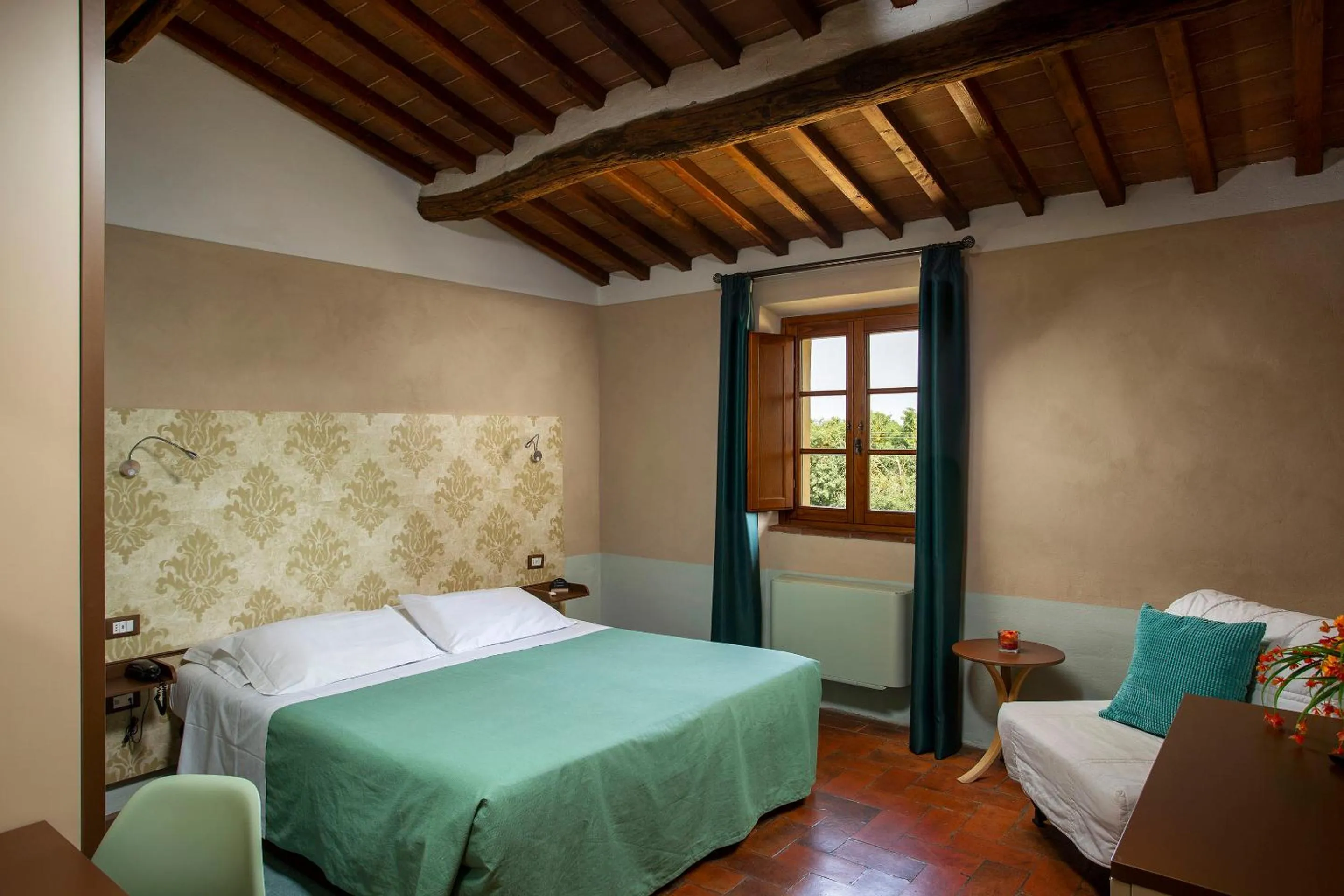 Bed in Hotel Le Capanne