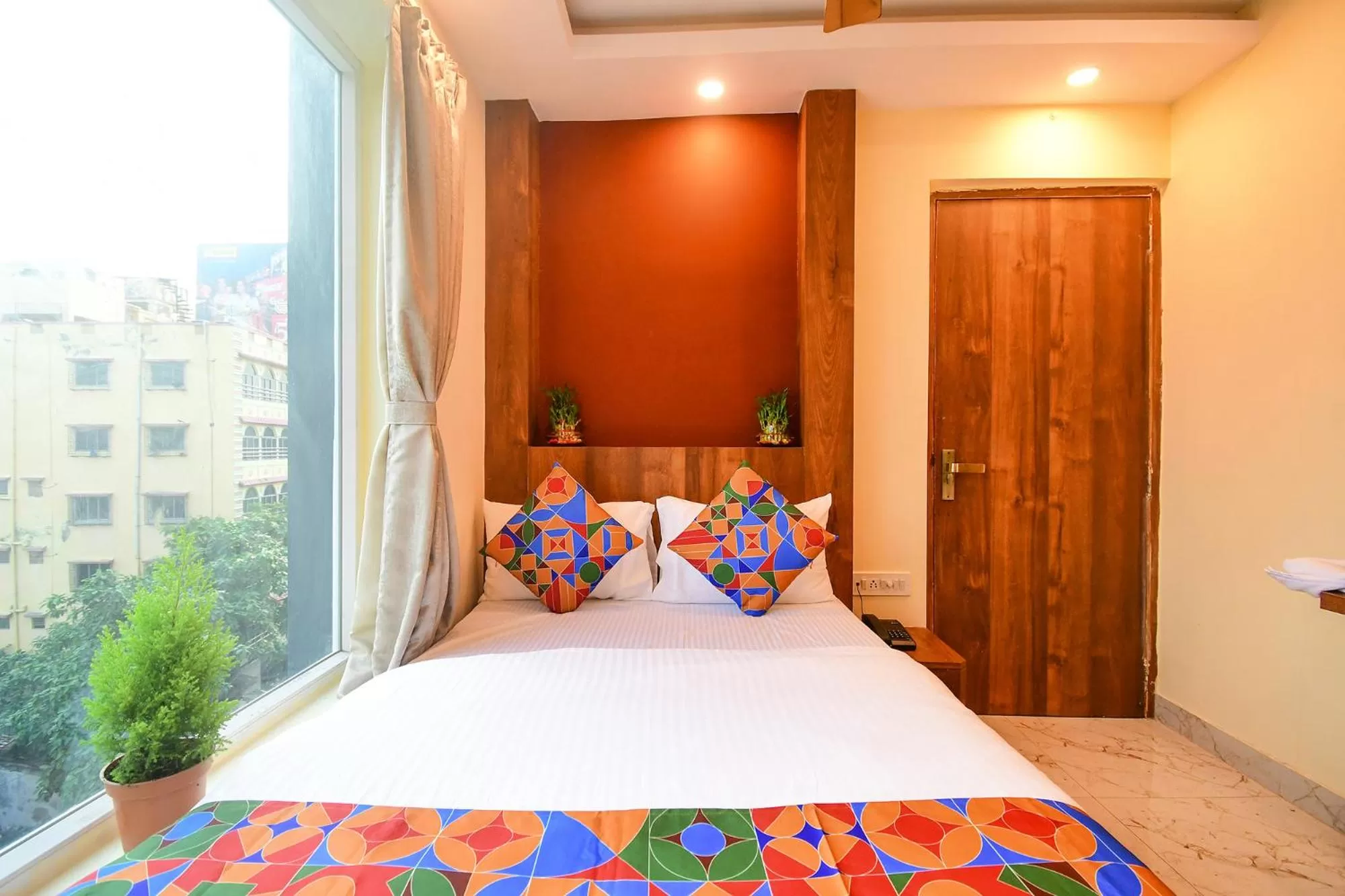 Bed in FabHotel Aqua Tulip - Nr Milan Mela