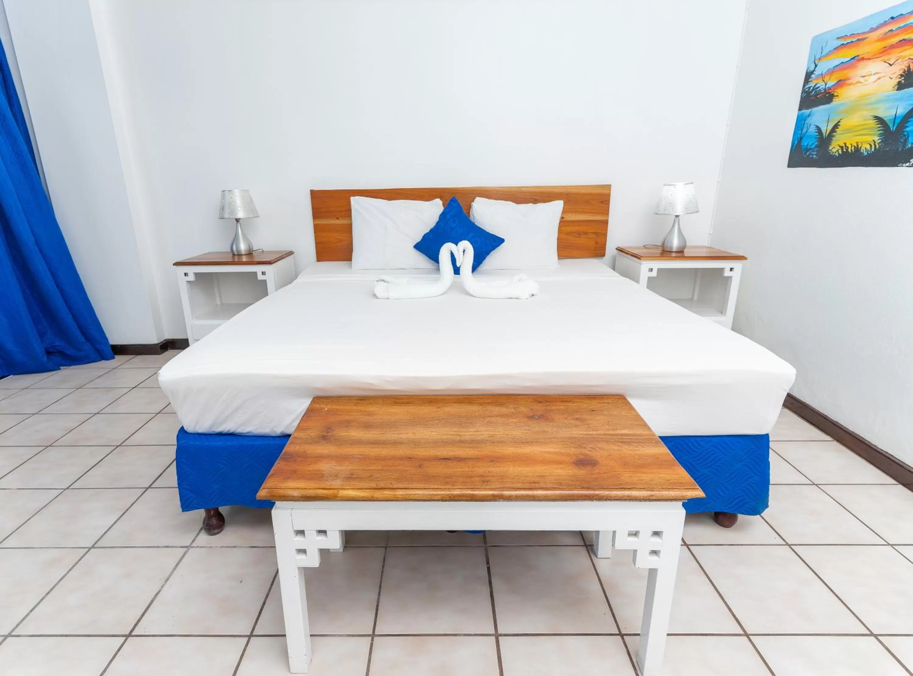 Bed in Sand and Tan Beach Hotel