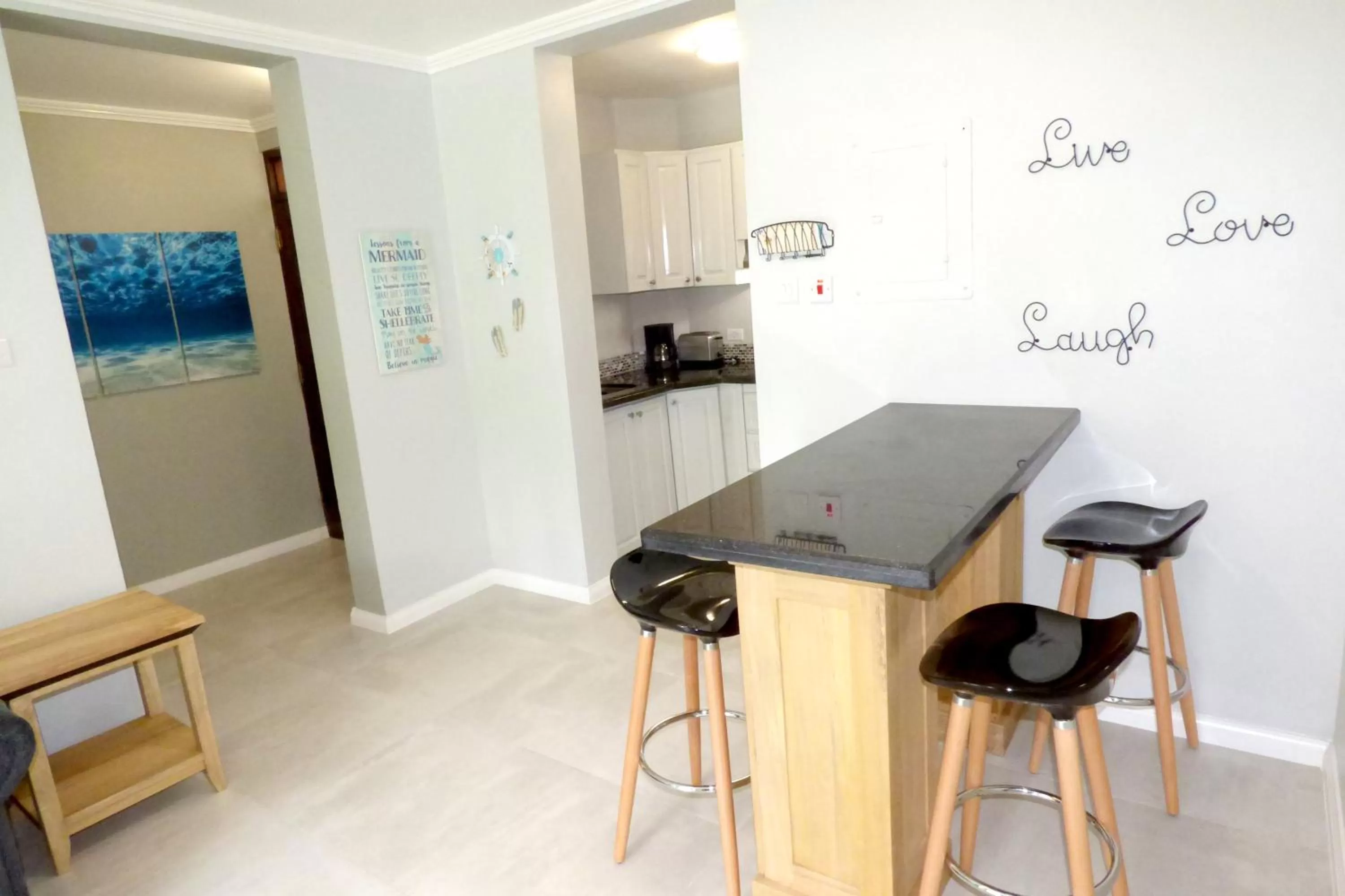 Kitchen or kitchenette in Beach One Bedroom Suite A22
