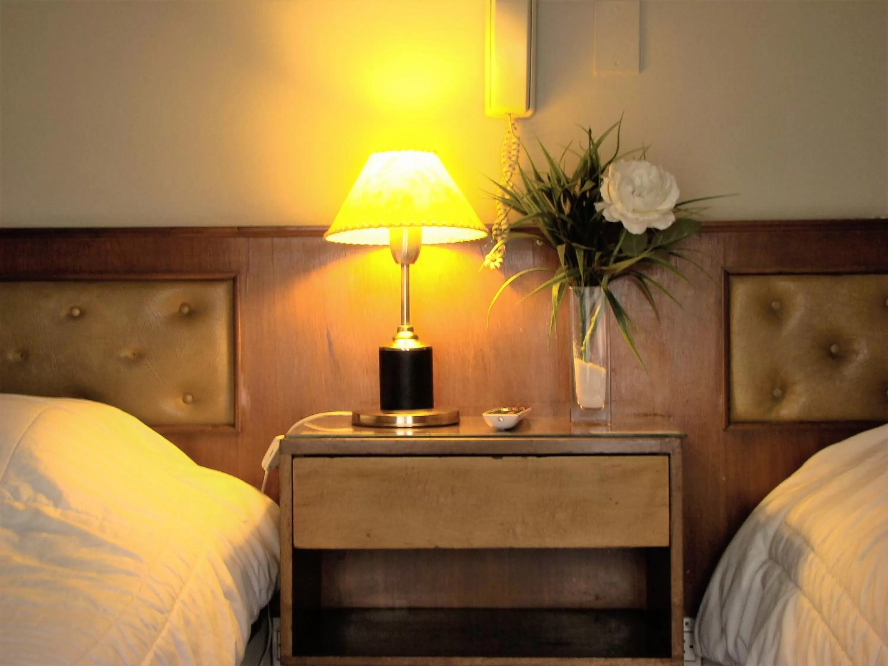 Bed in Petit Recoleta Suites