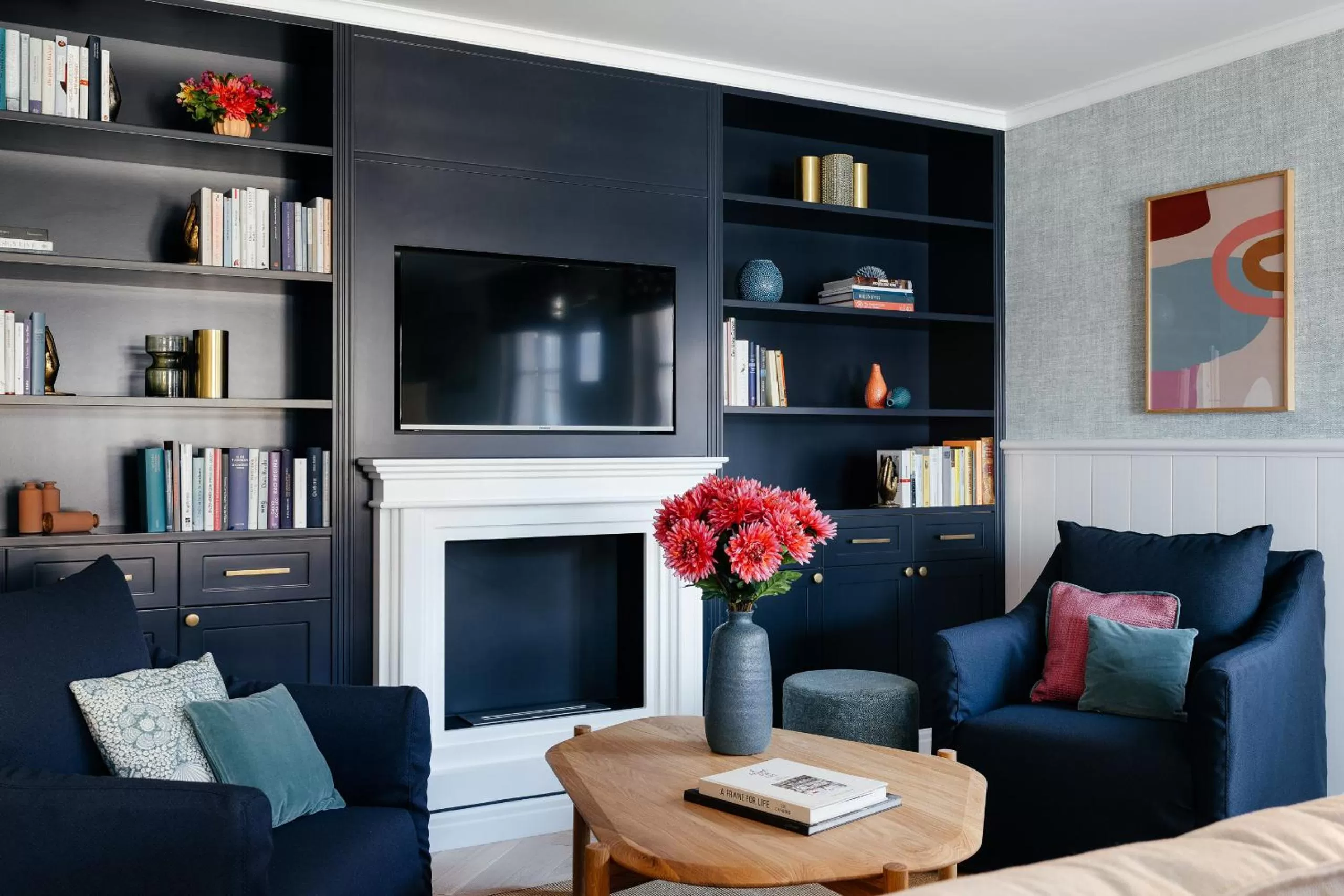 Communal lounge/ TV room in Villa Alma - a lakeside Boutique Hotel