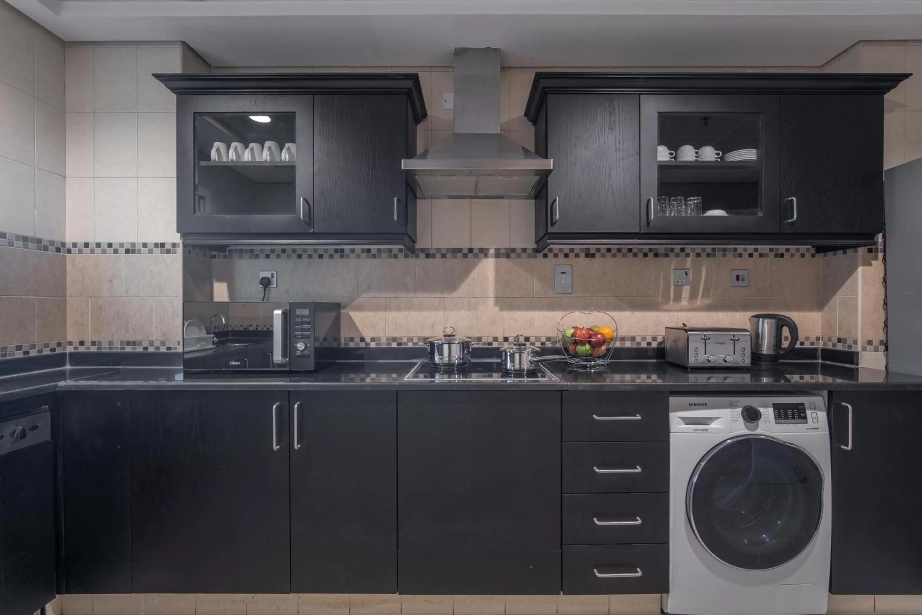 Kitchen or kitchenette in Rose Garden Hotel Apartments - Al Barsha, Near Metro Station