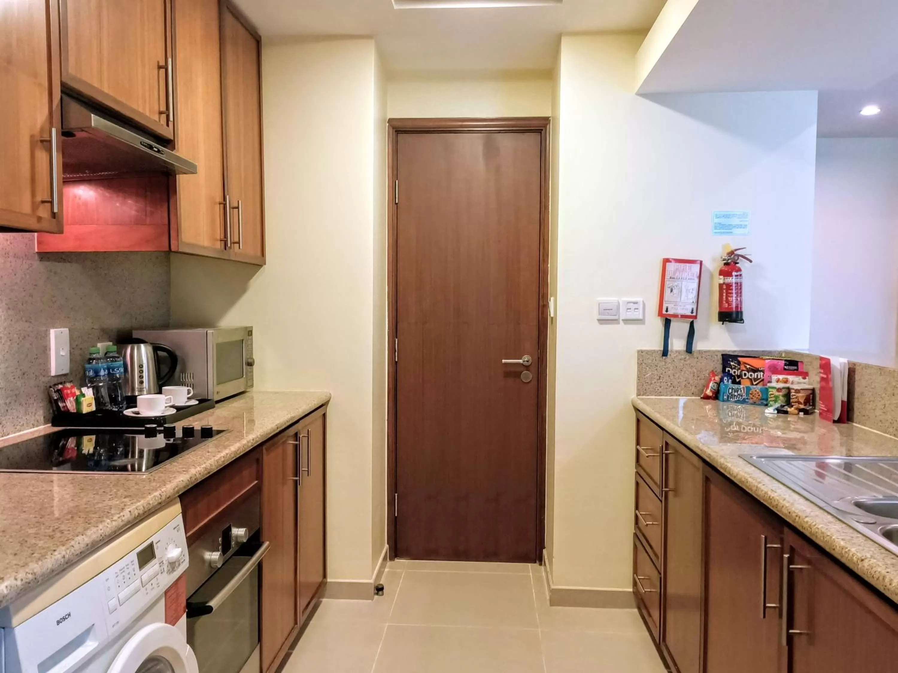 Kitchen or kitchenette in Ramada by Wyndham Downtown Dubai