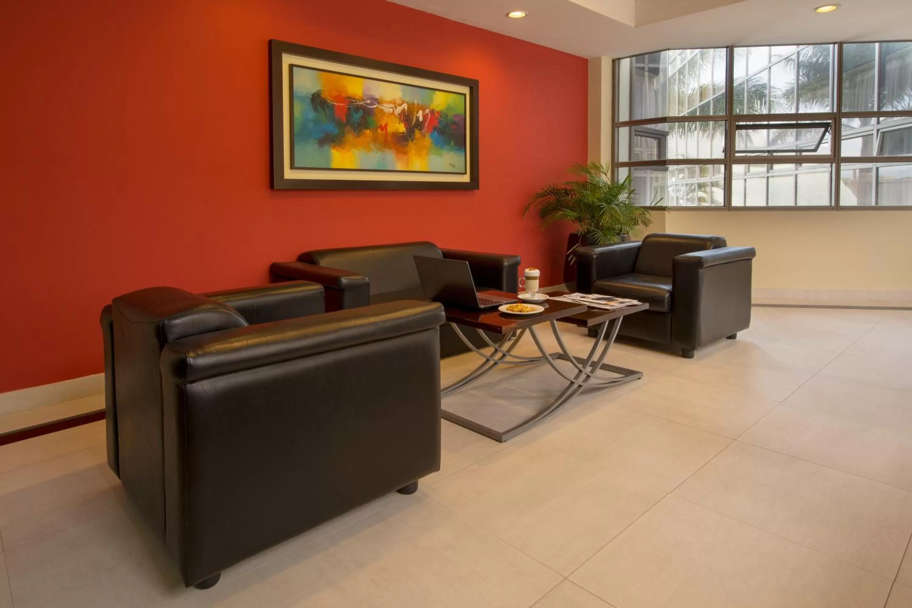 Communal lounge/ TV room in Hotel Palma Real