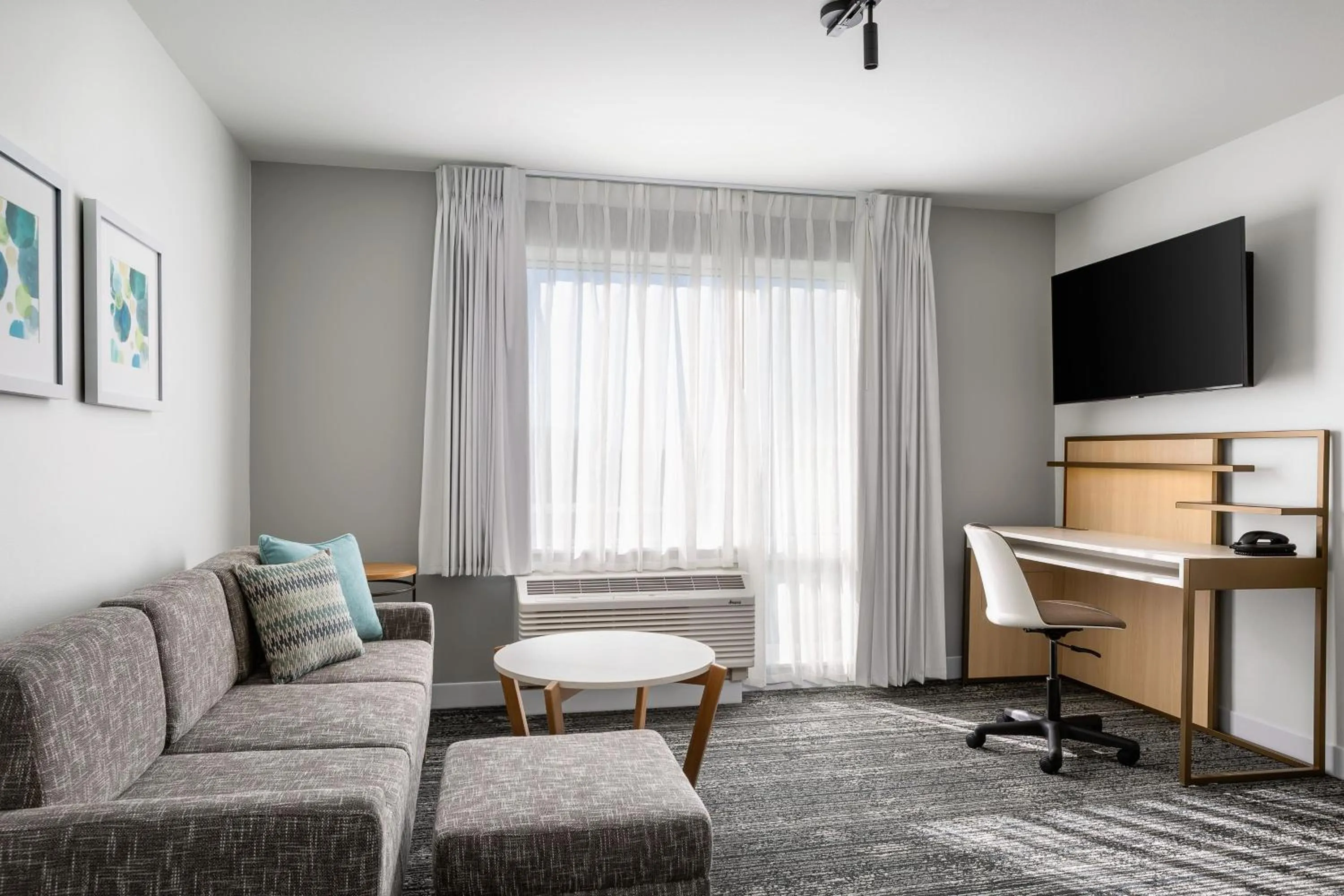 Living room in TownePlace Suites by Marriott Iron Mountain