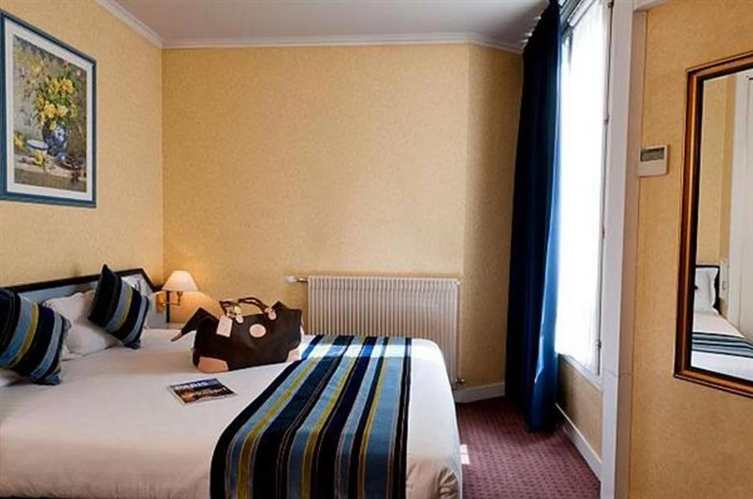 Bed in Hôtel Opera Deauville