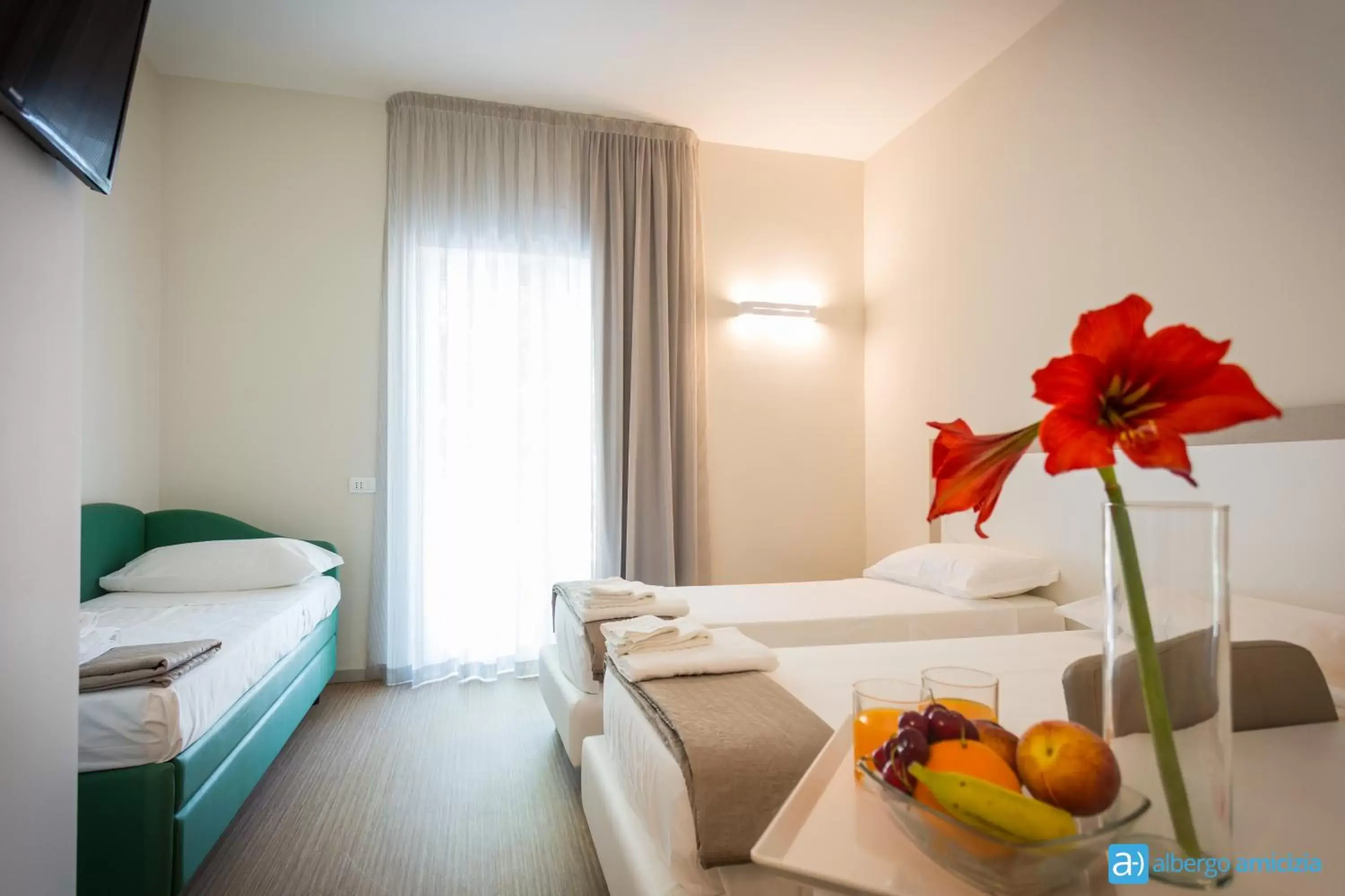 Triple Room with Balcony in Hotel Amicizia Triple Room with Balcony in Hotel Amicizia