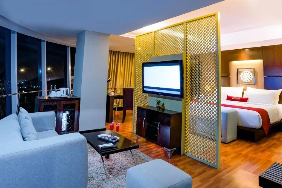 Bed in Emersia Hotel and Resort