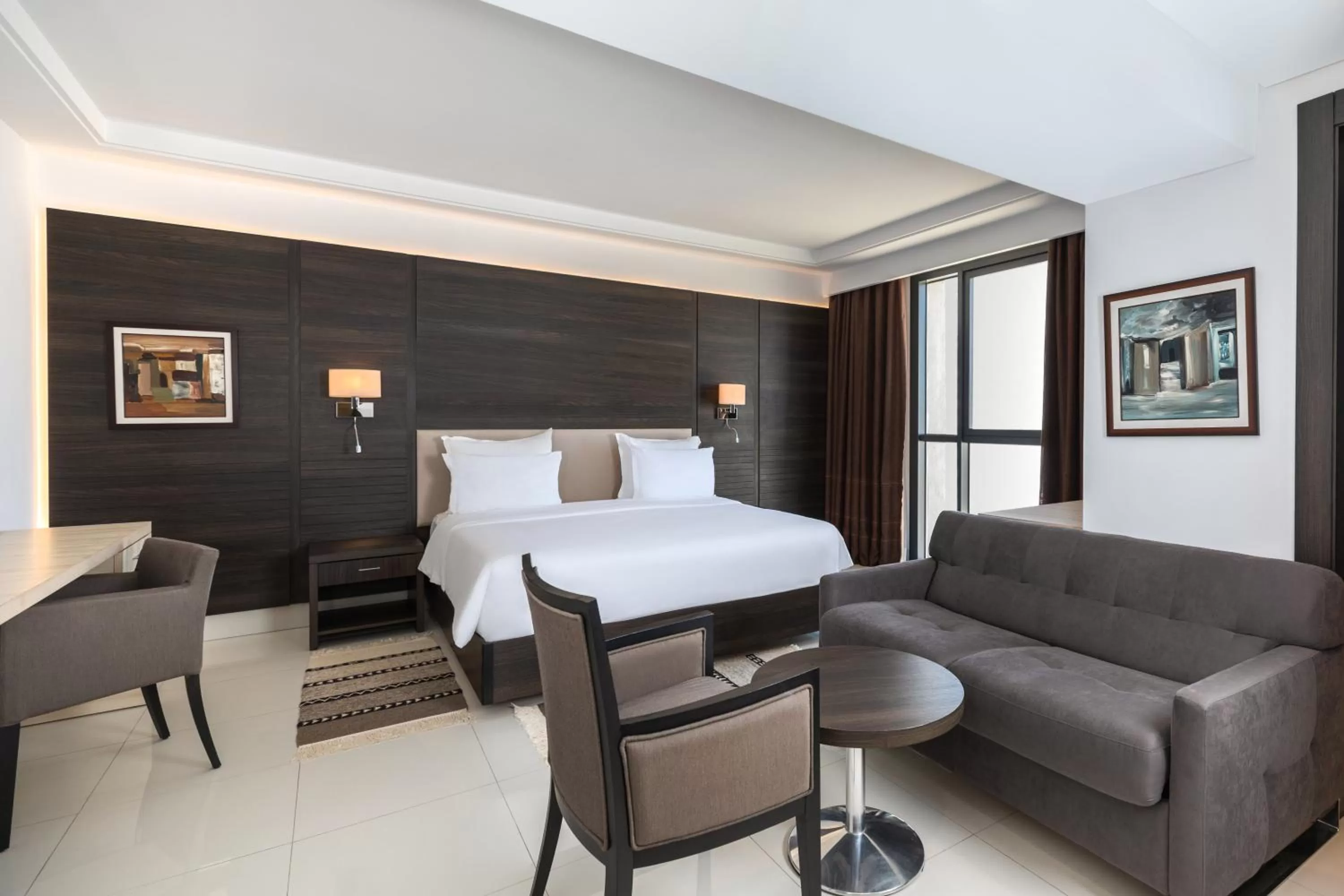 Seating area, Bed in Radisson Hotel Sfax