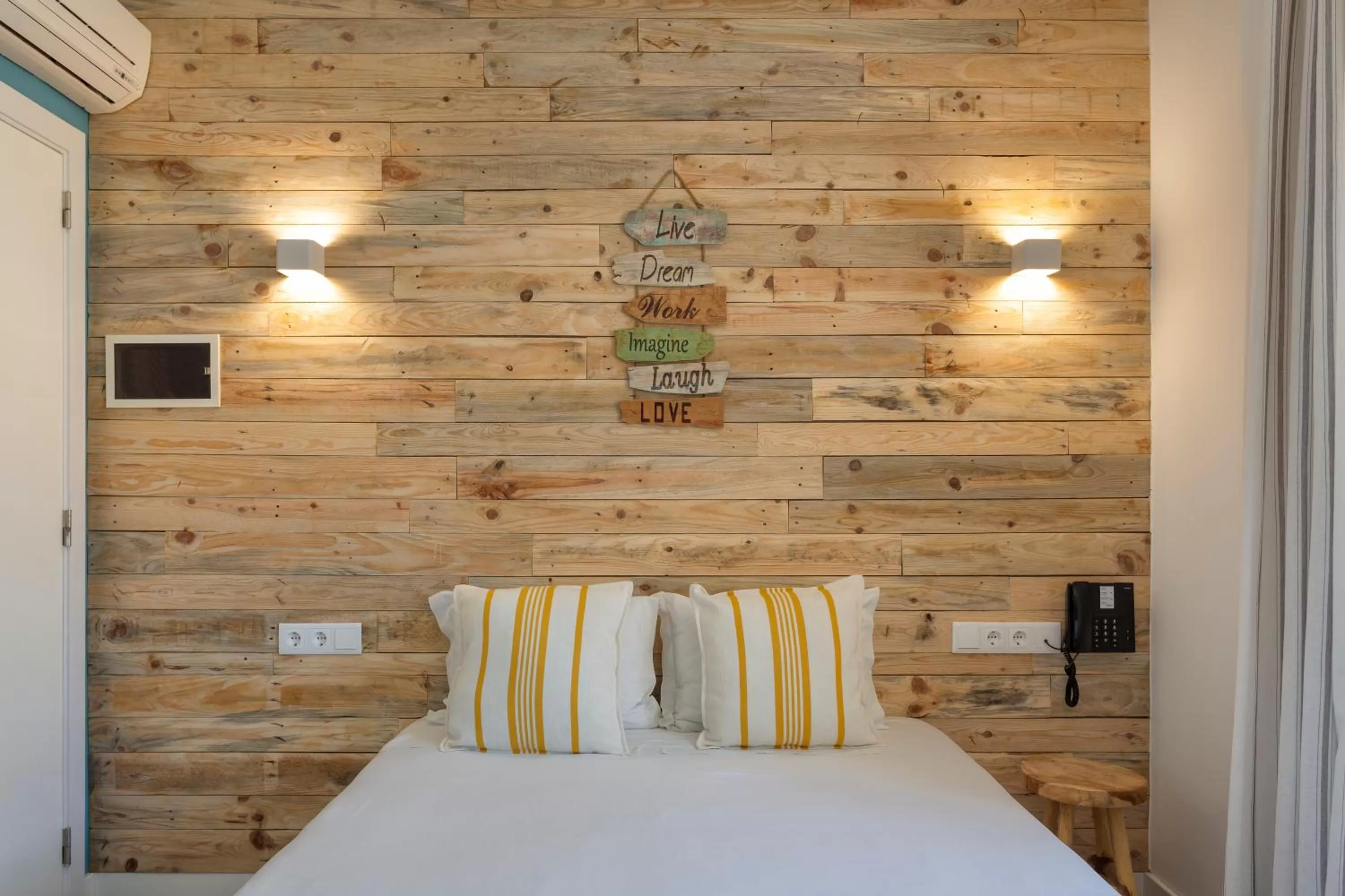 Bed in Hotel Made Inn