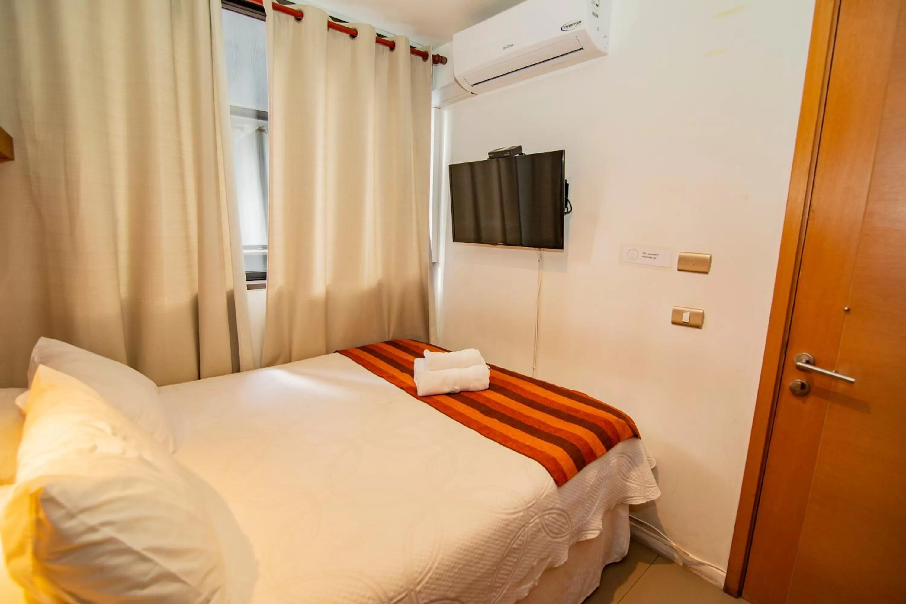 Communal lounge/ TV room, Bed in Hotel Cumbres del Sur