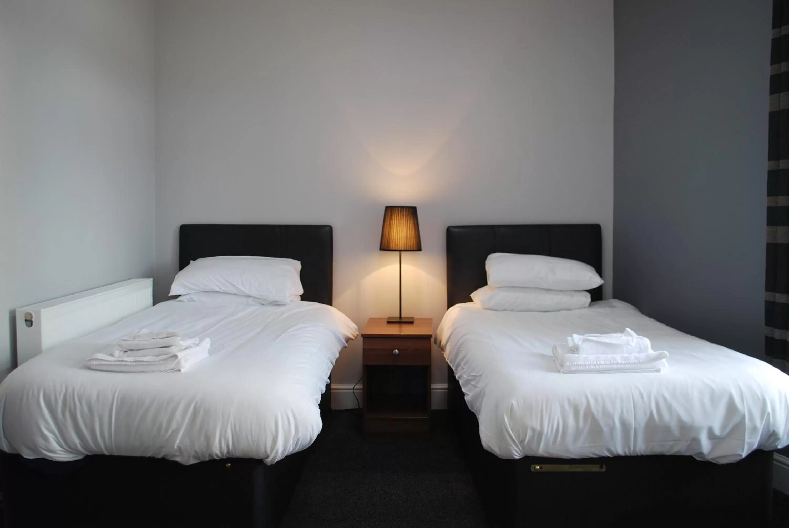 Bed in The Liverpool Inn Hotel