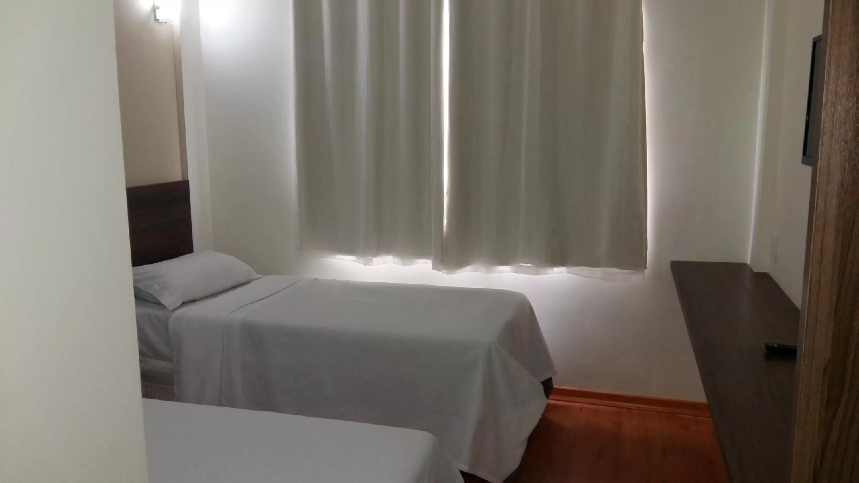 Bed in Hotel Pit Stop Oliveira-MG