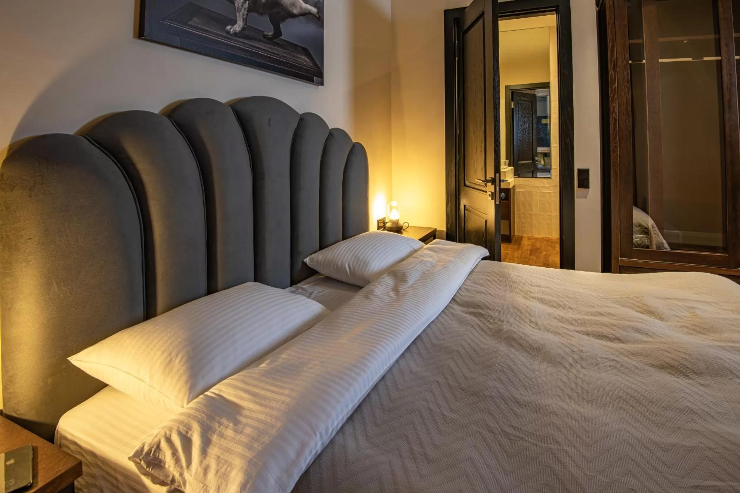 Bed in Warm House Apart Hotel