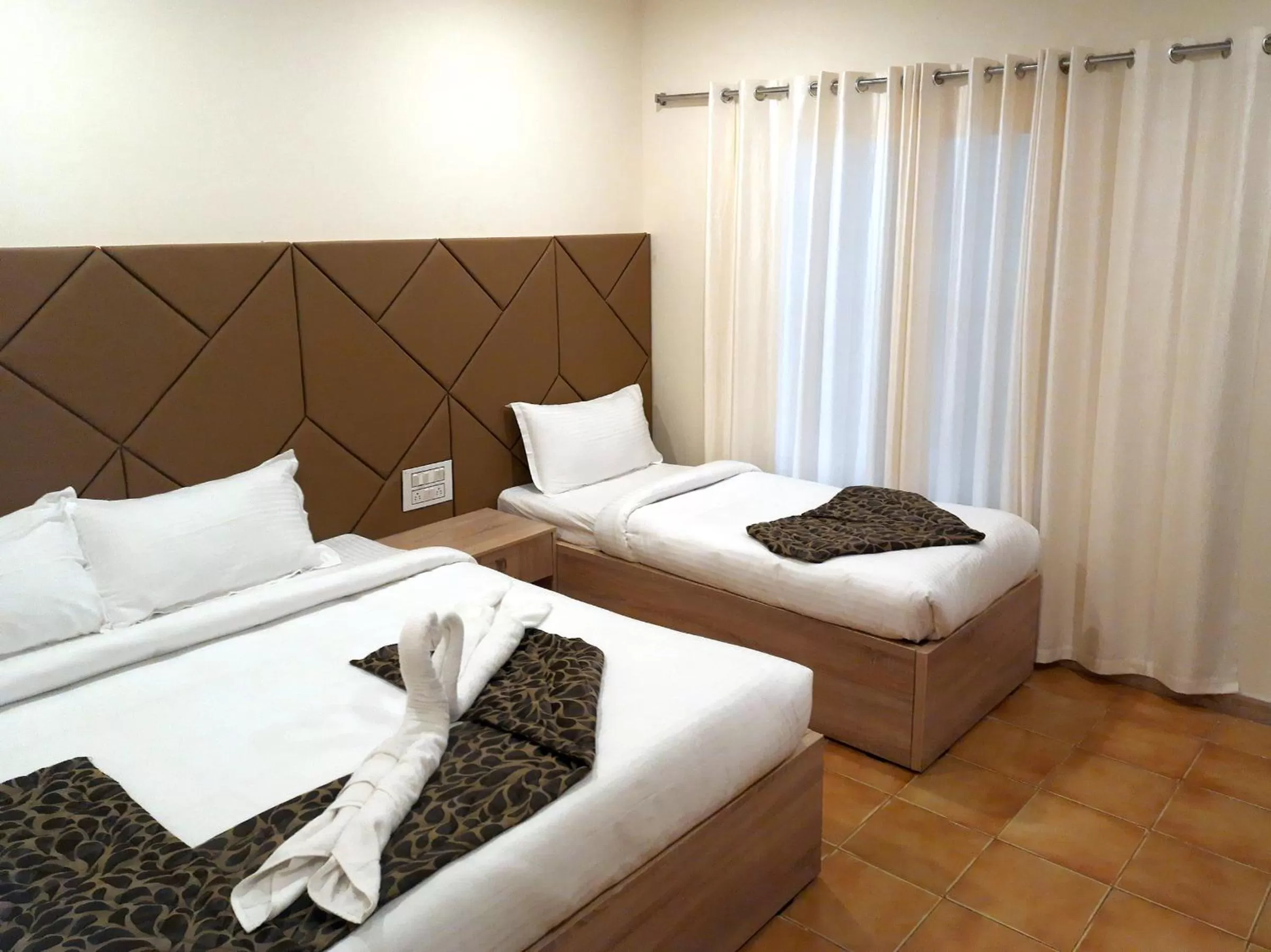 Bed in GRAND KODAI SR INN