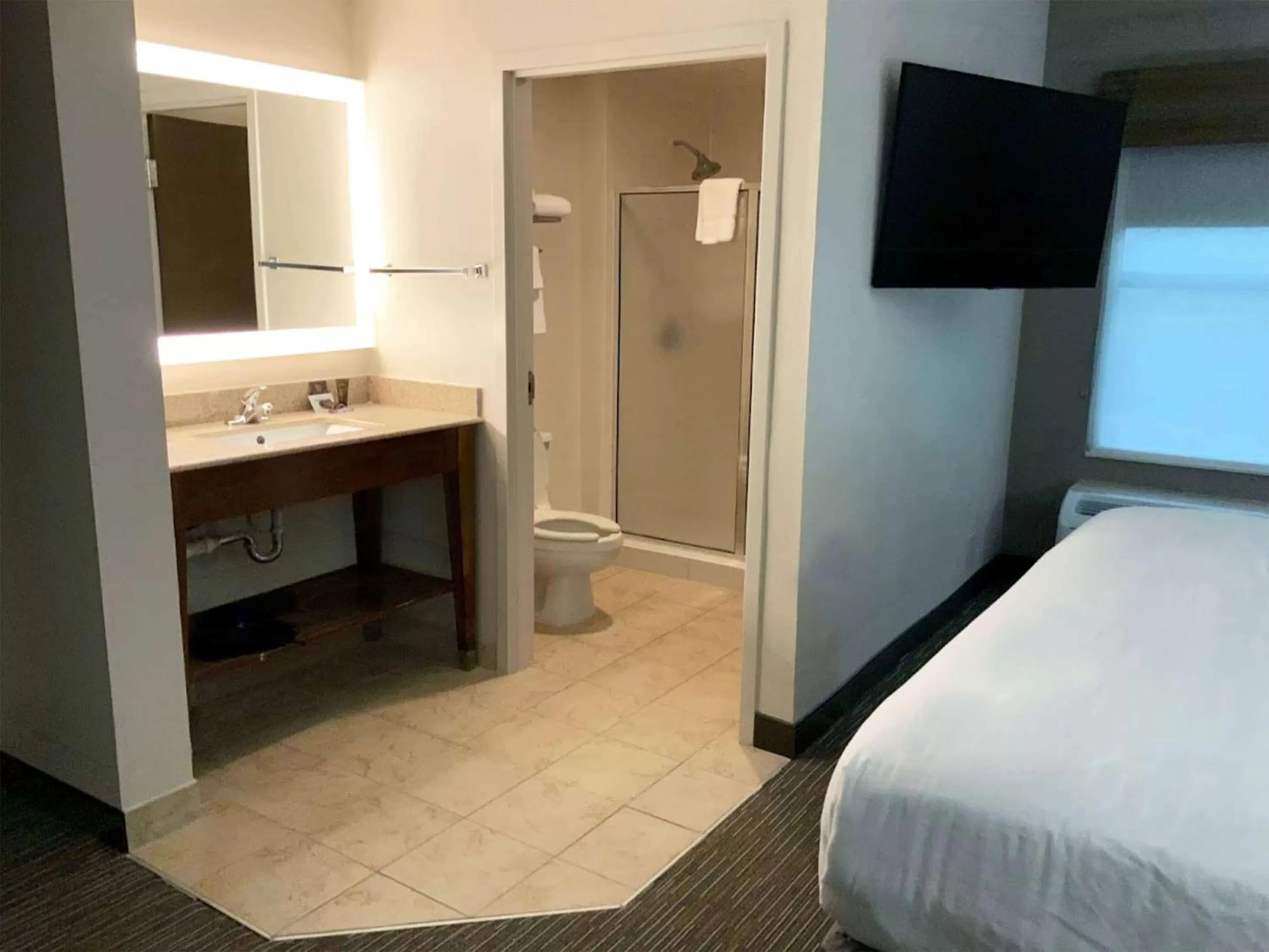 Bathroom, Bed in Wingate by Wyndham Jackson Ridgeland