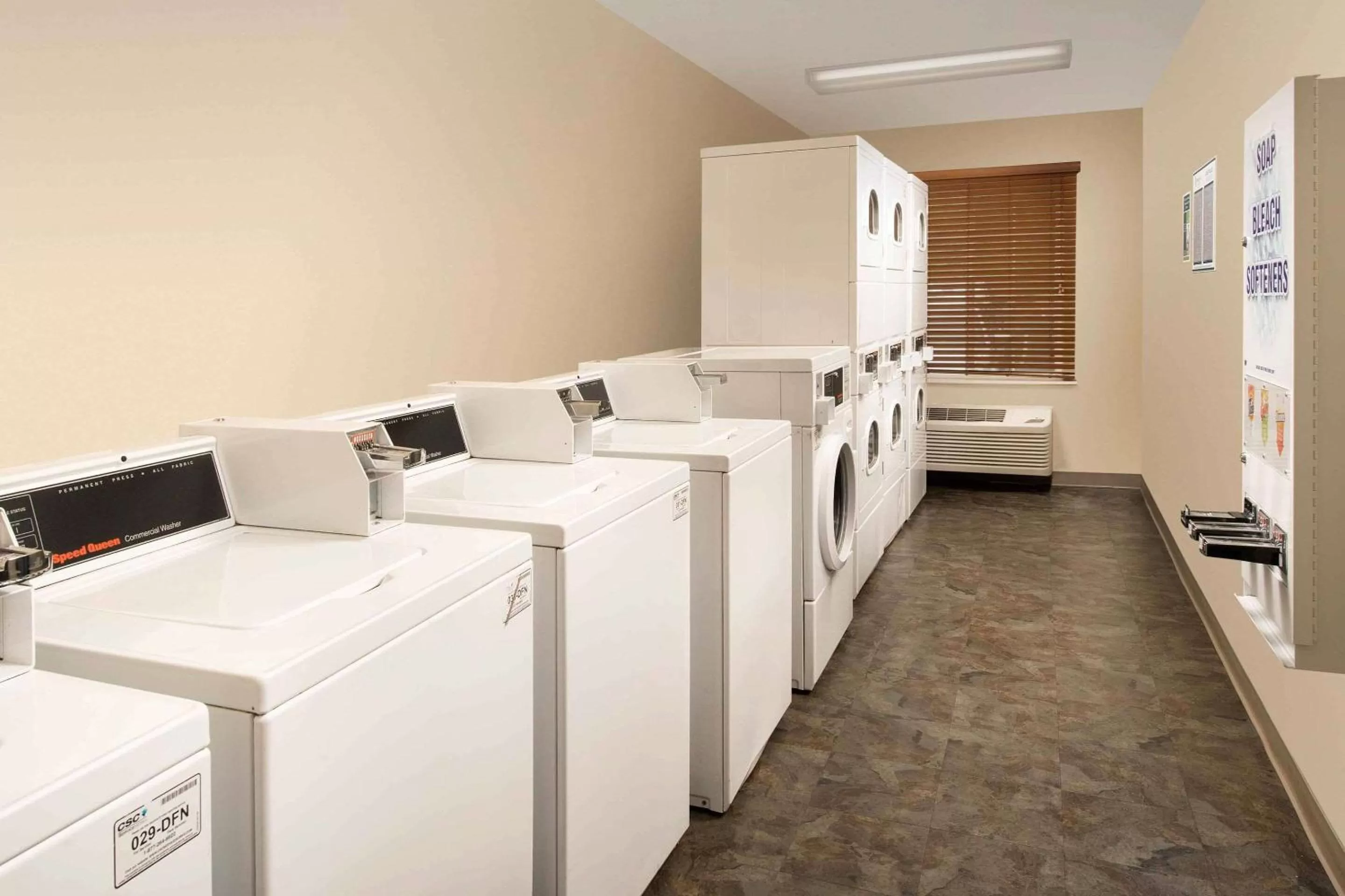 laundry in WoodSpring Suites Spartanburg - Duncan