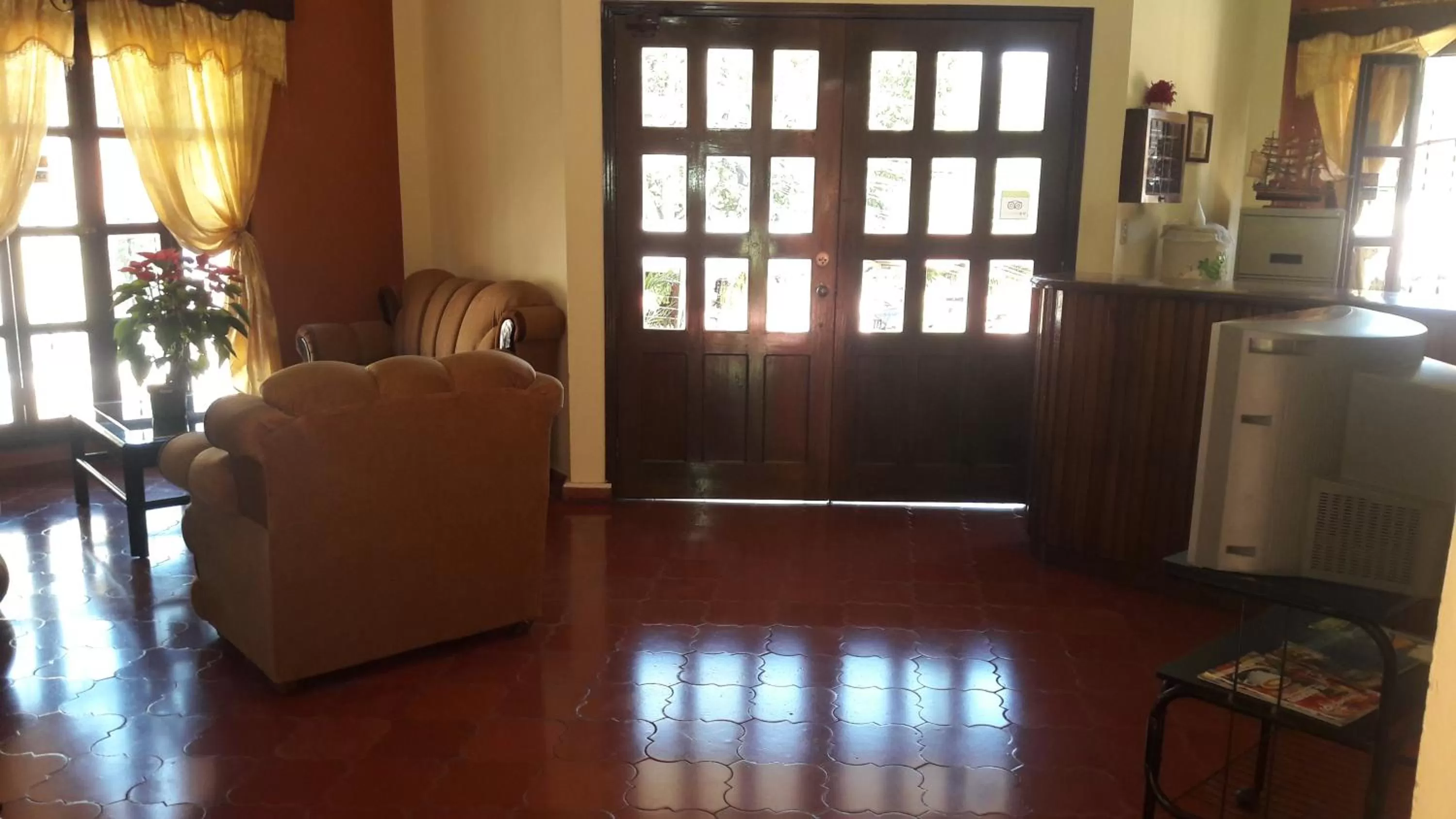 Living room in Hotel Acropolis Maya