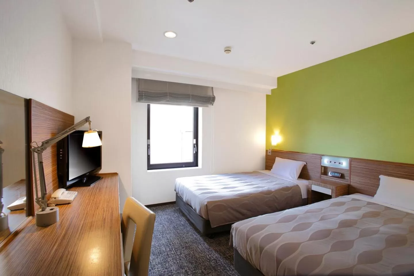 Bed in CYPRESS HOTEL Nagoya-eki Mae