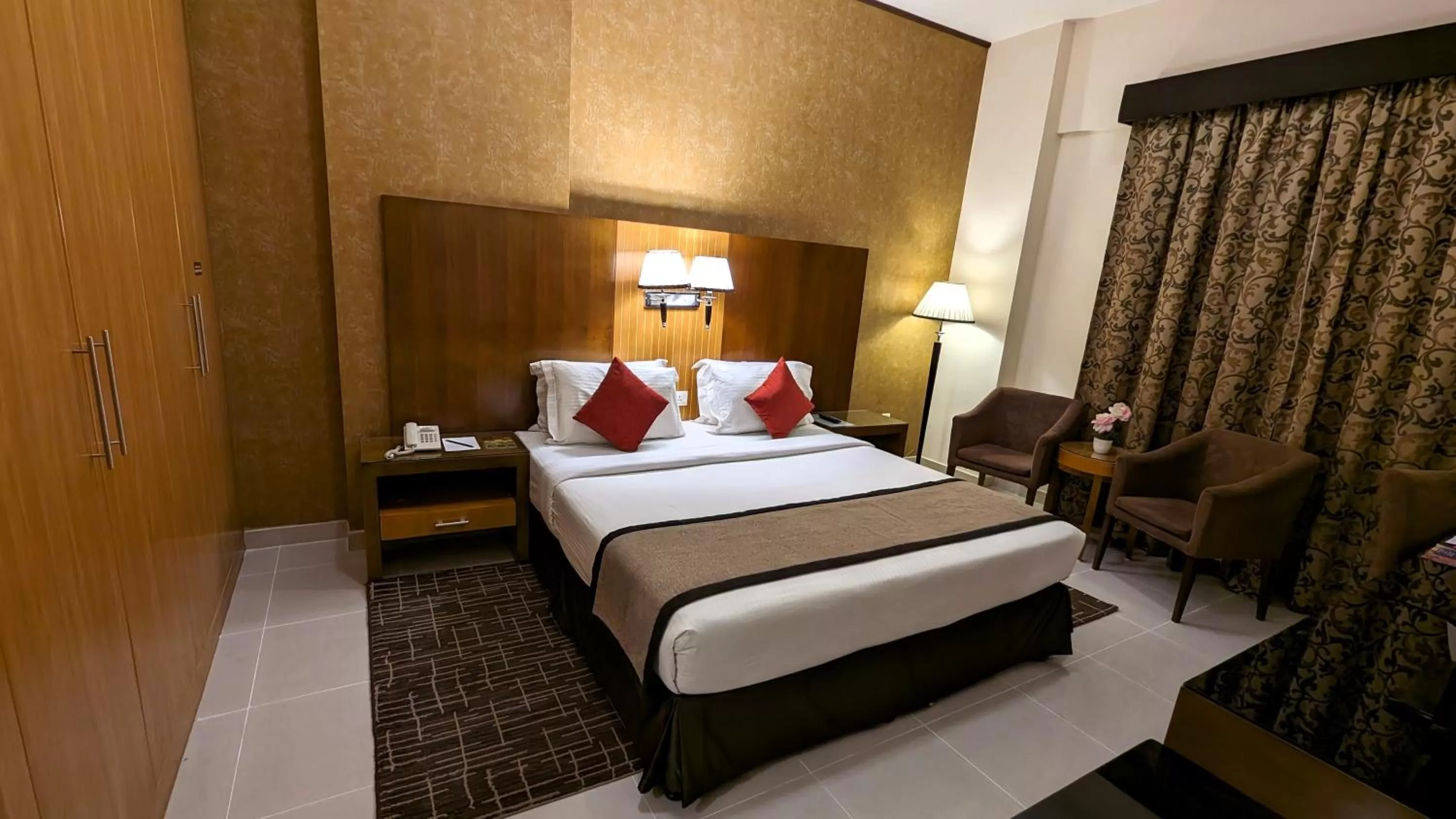 Bed in City Tower Hotel