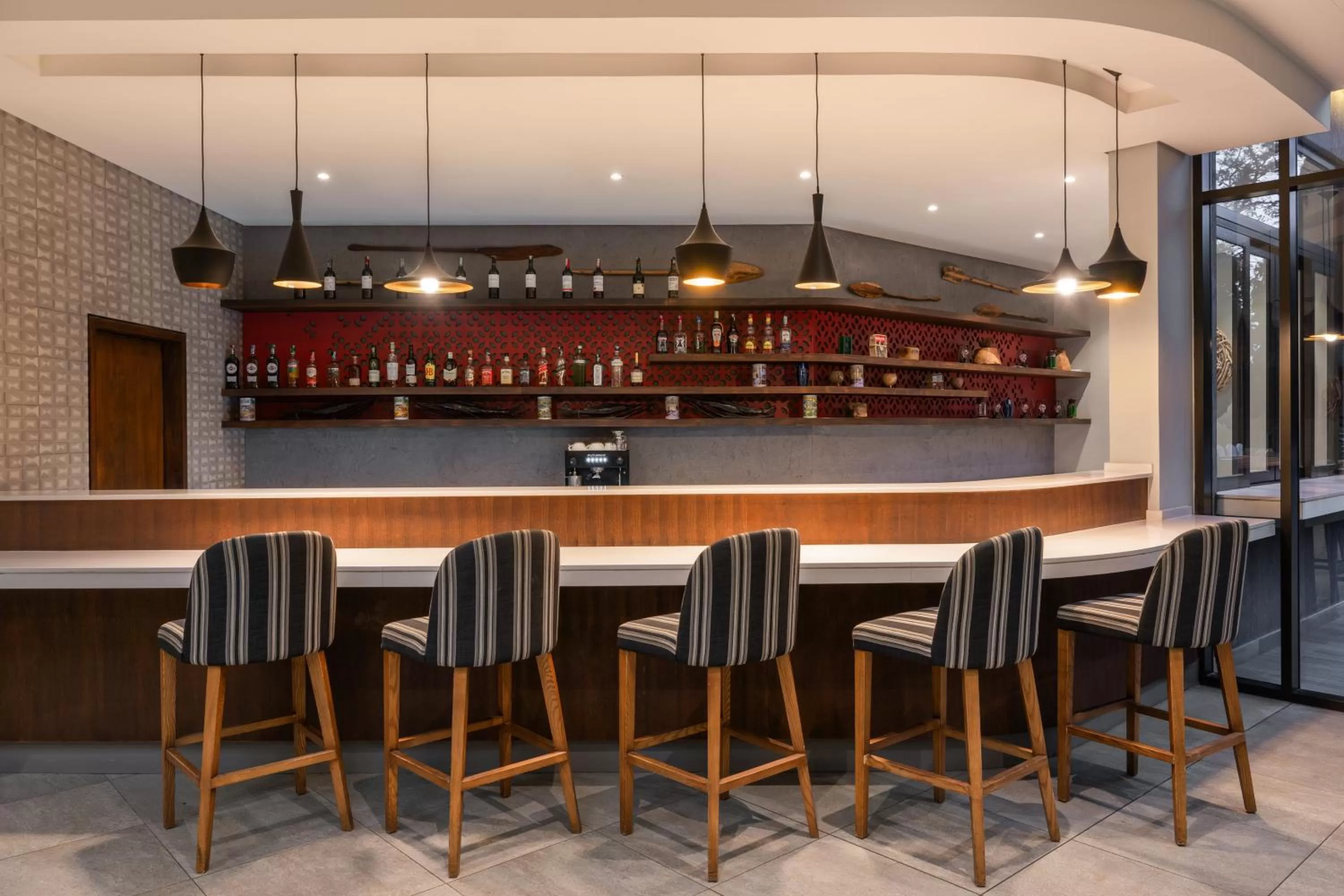 Lounge or bar in Crowne Plaza - Dar Es Salaam by IHG