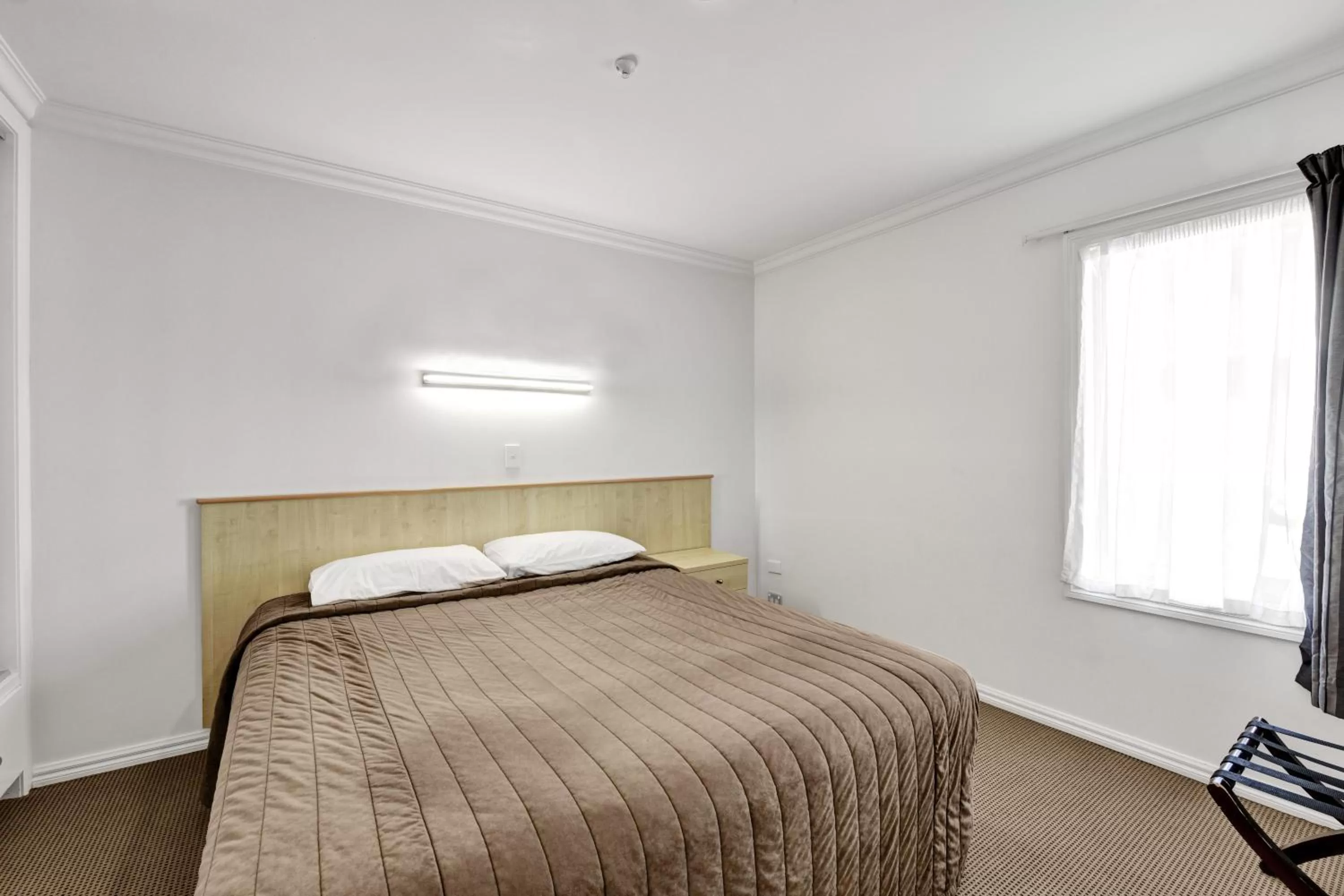 Bed in The Hotel Nelson