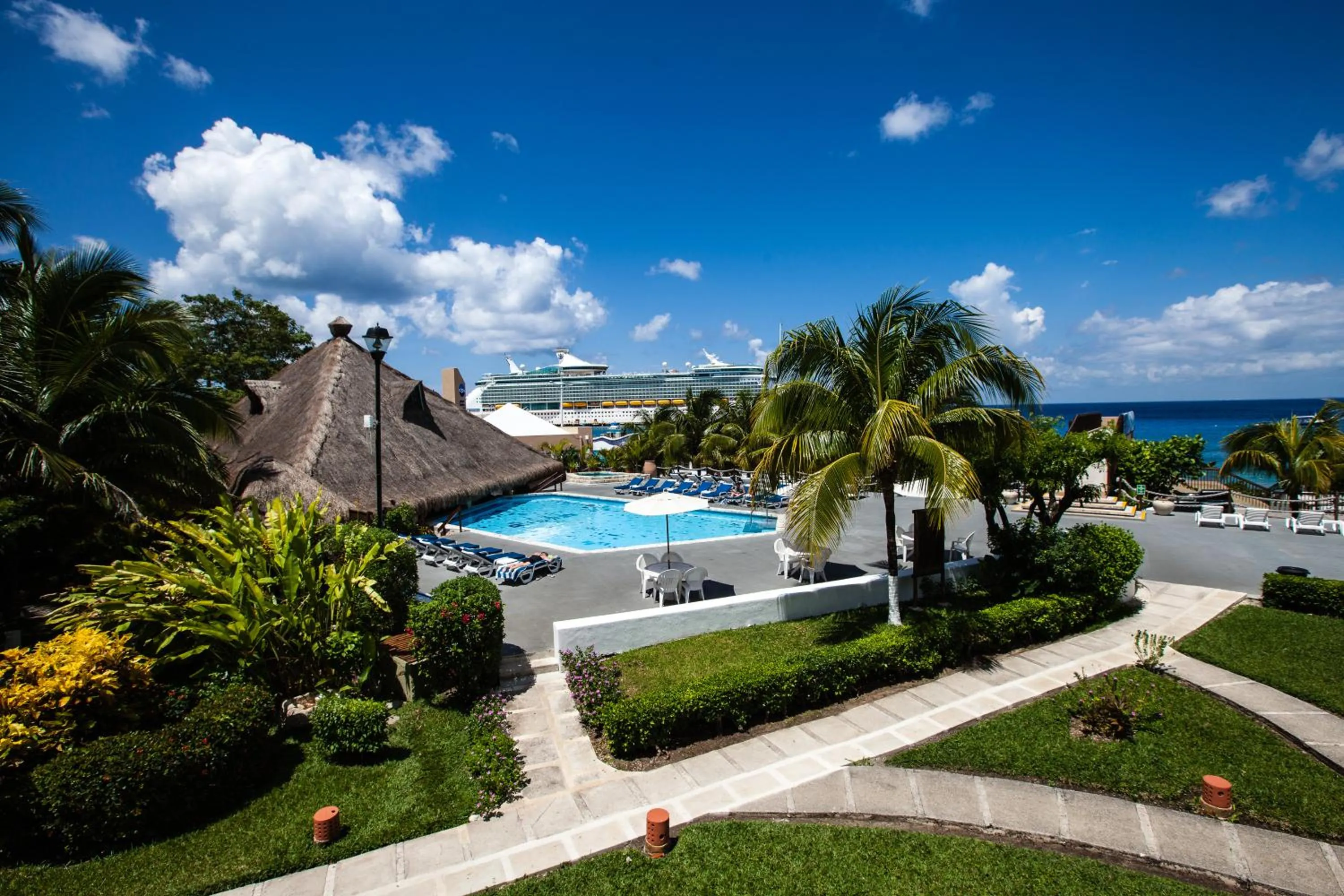 Garden in Casa del Mar Cozumel Hotel & Dive Resort with free access to an exclusive beach club