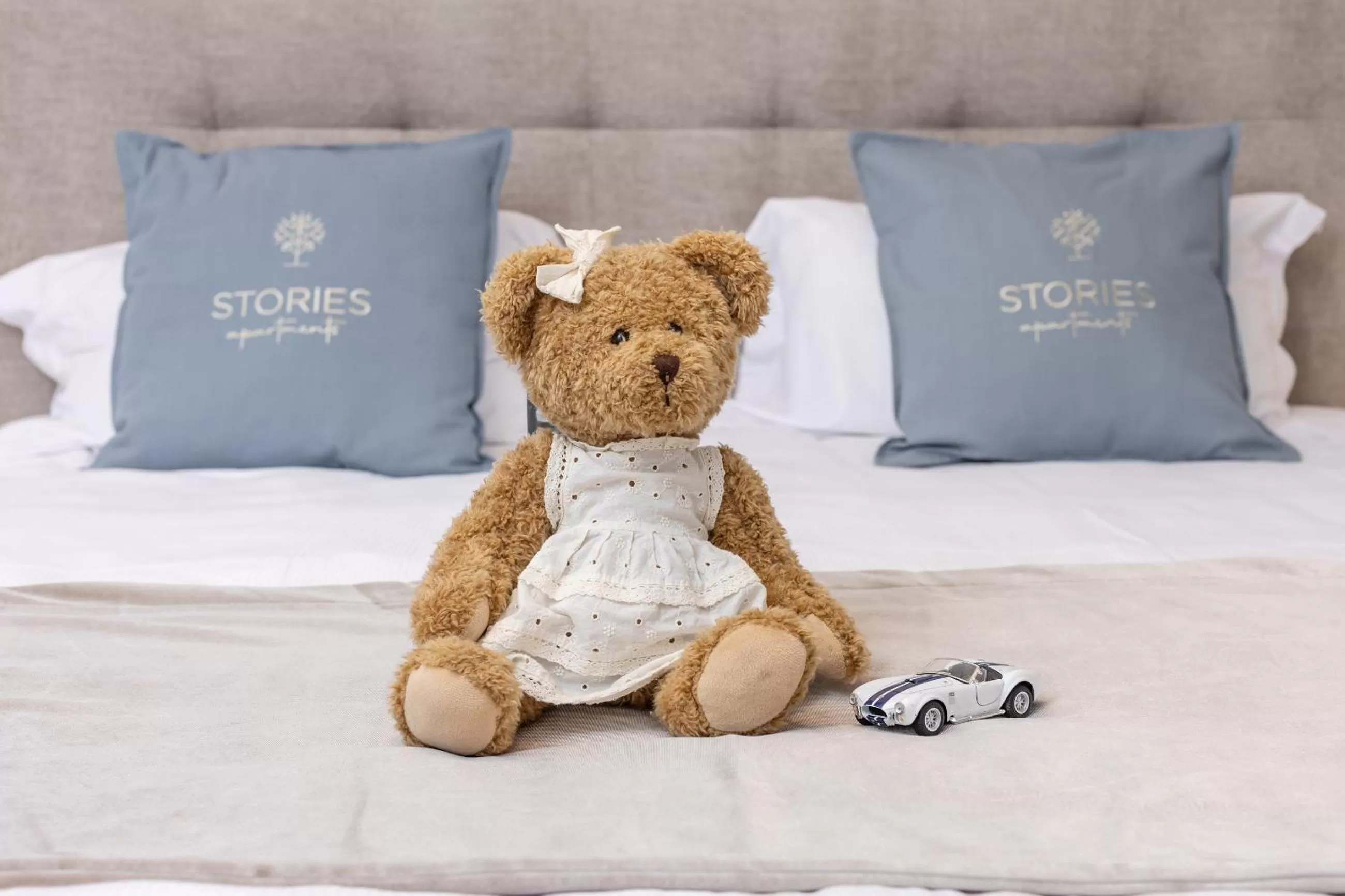 Bed in STORIES Design ApartHotel