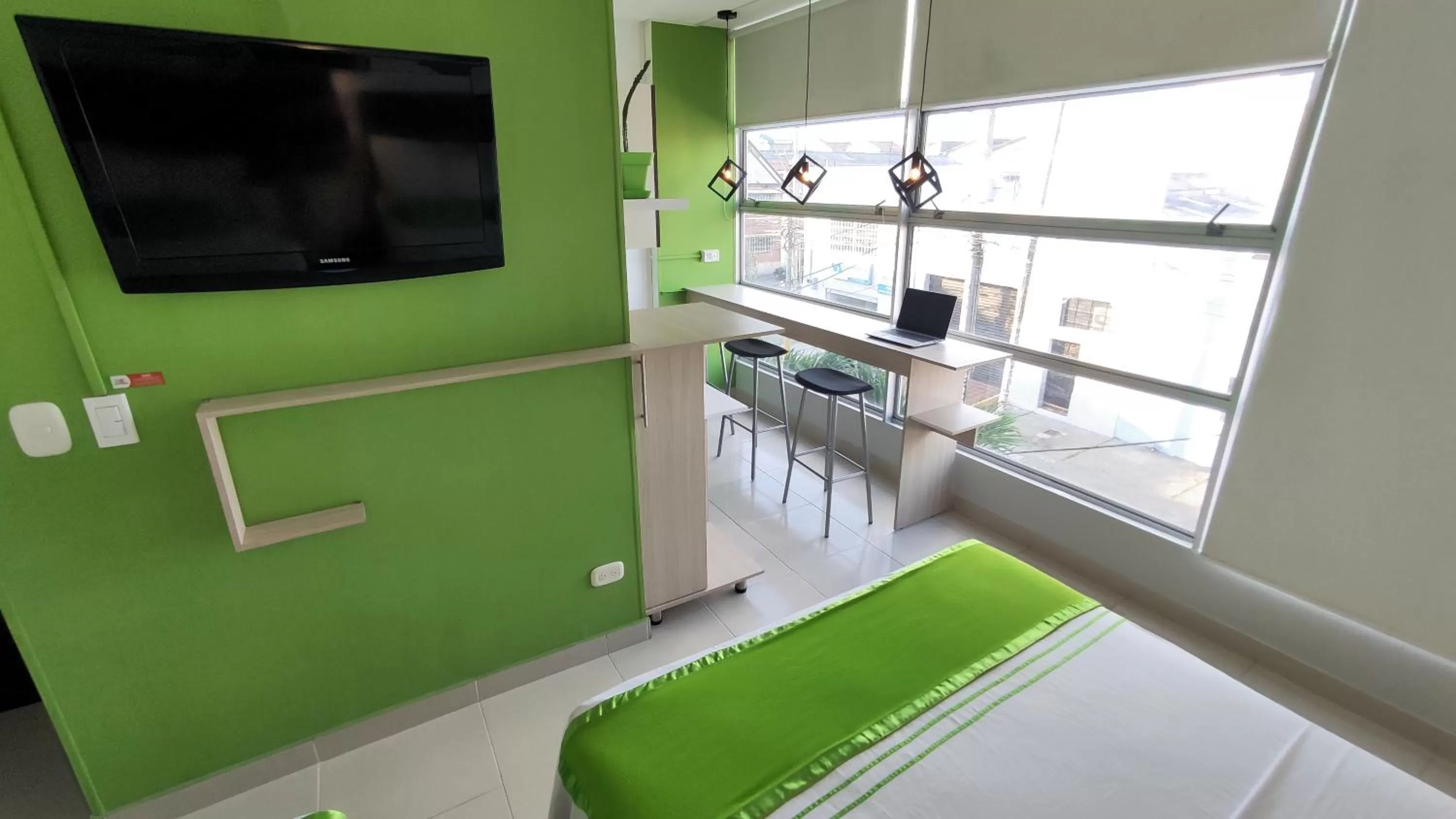 TV and multimedia, TV/Entertainment Center in HOTEL COLOURS Cali