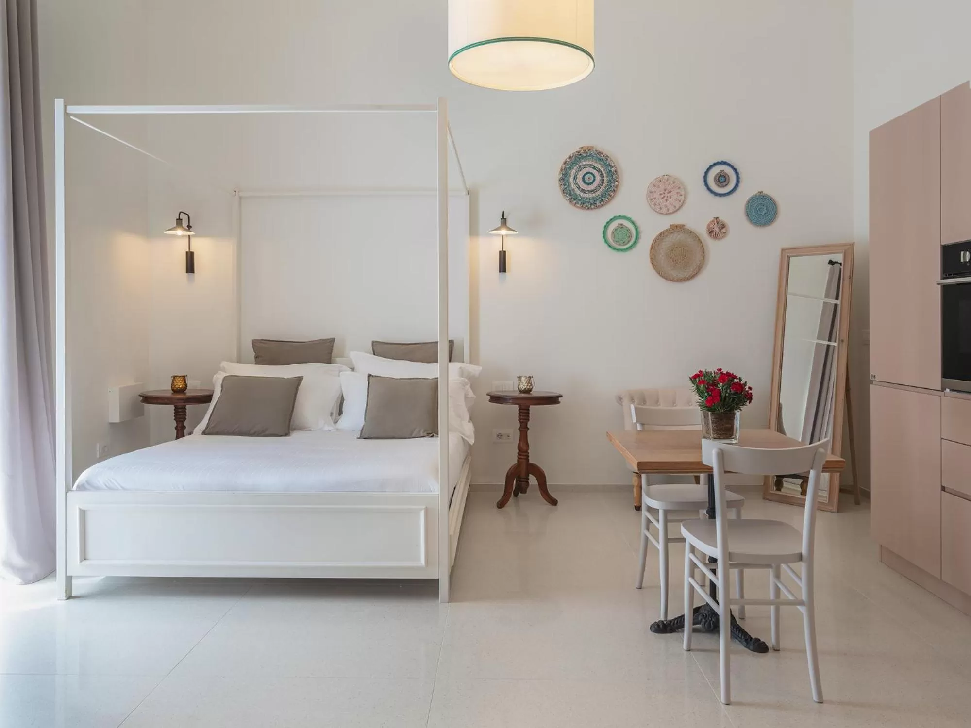 Photo of the whole room, Bed in Living u HomeSuites