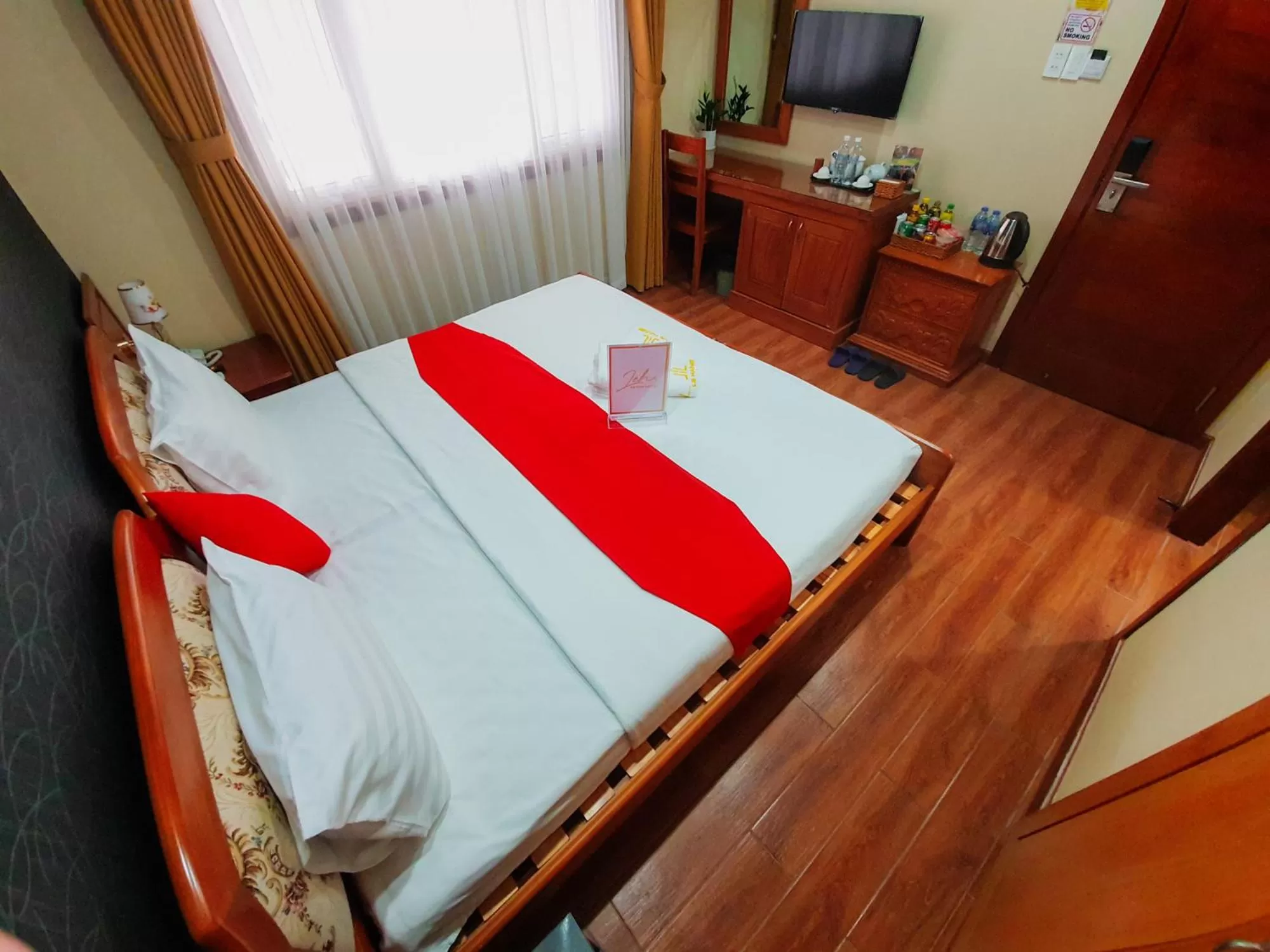 Bed in LEHA Saigon Hotel Airport