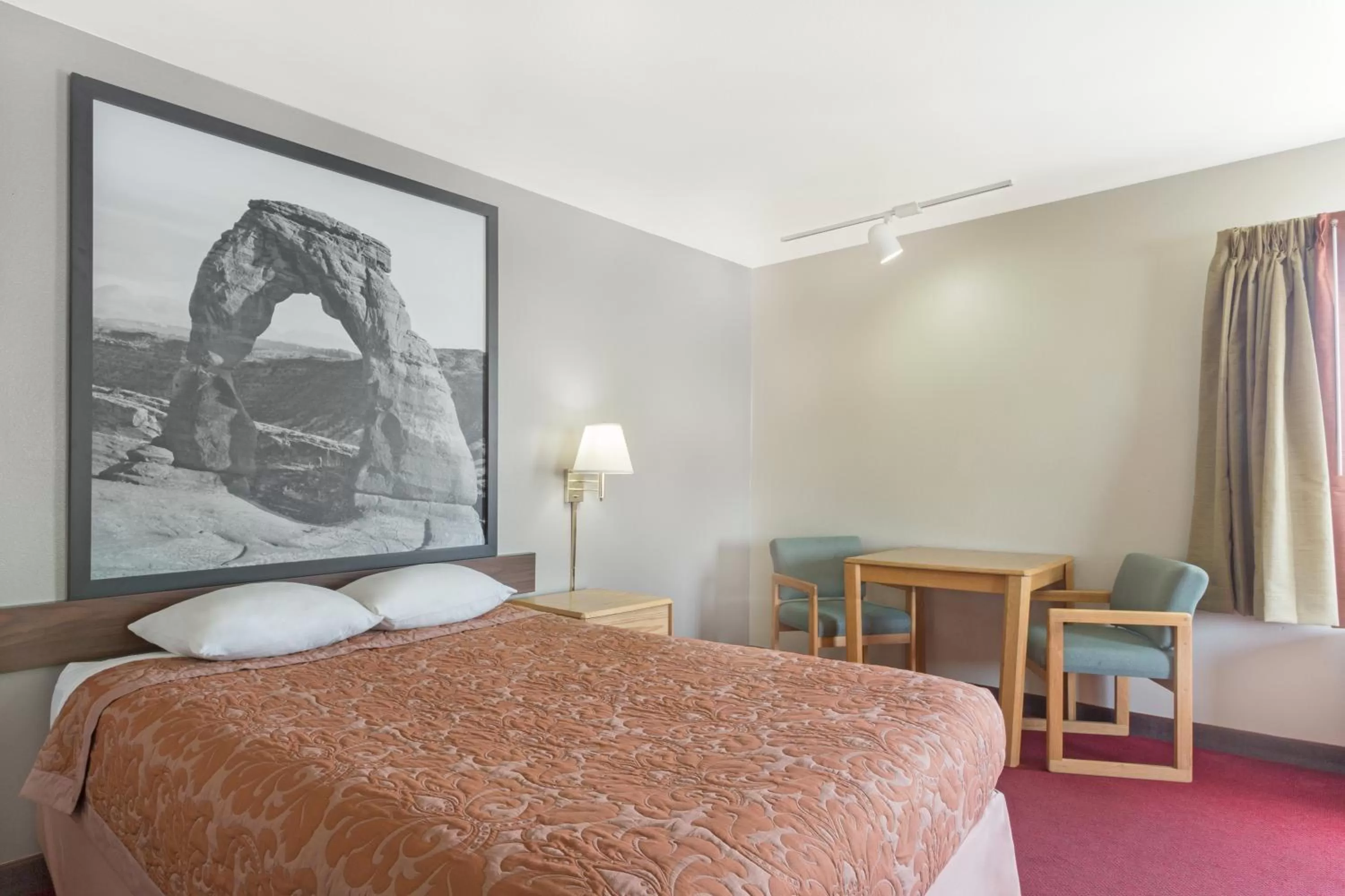 Decorative detail, Bed in Super 8 by Wyndham Green River