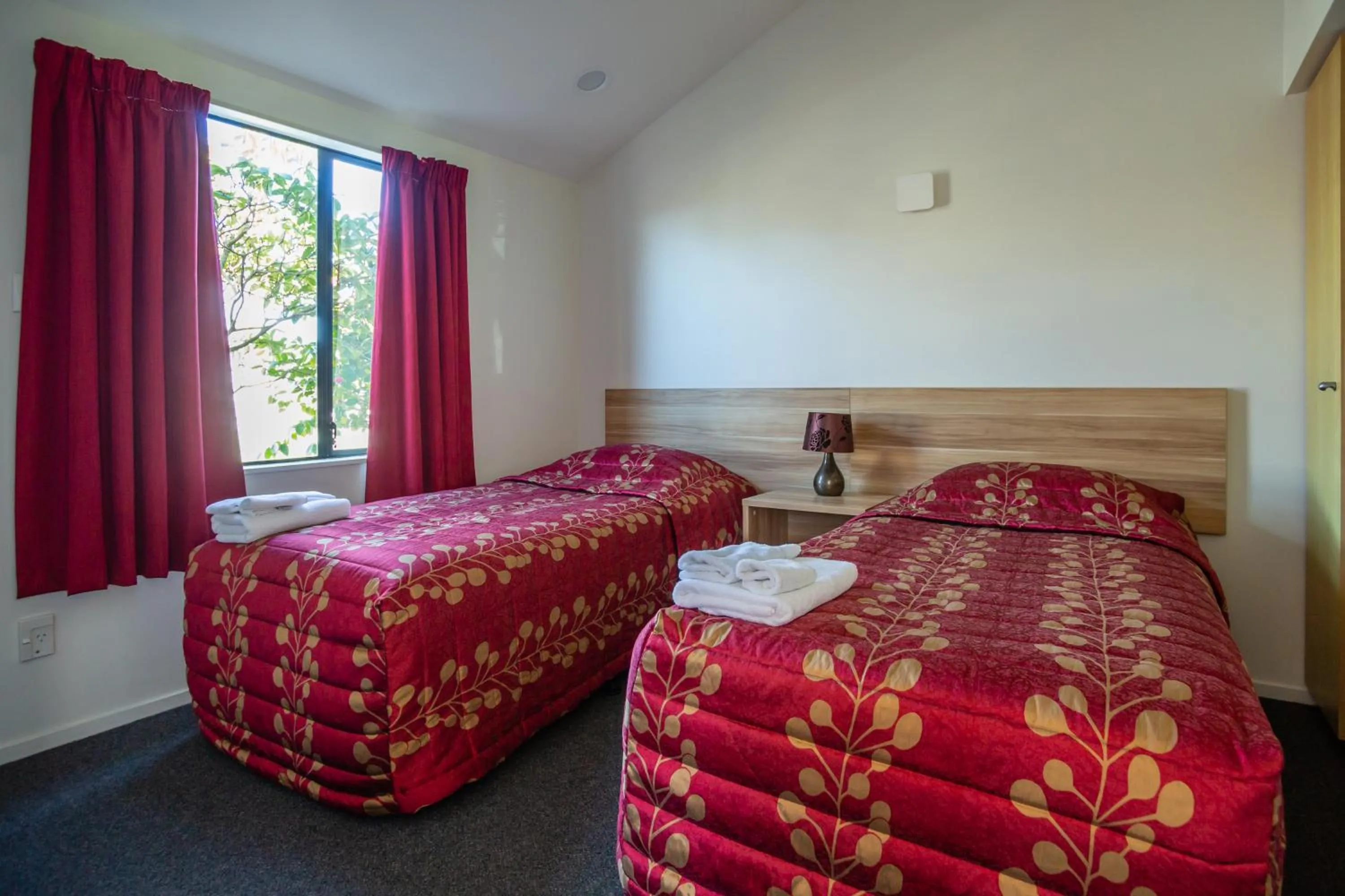 Bed in Christchurch Park Motel