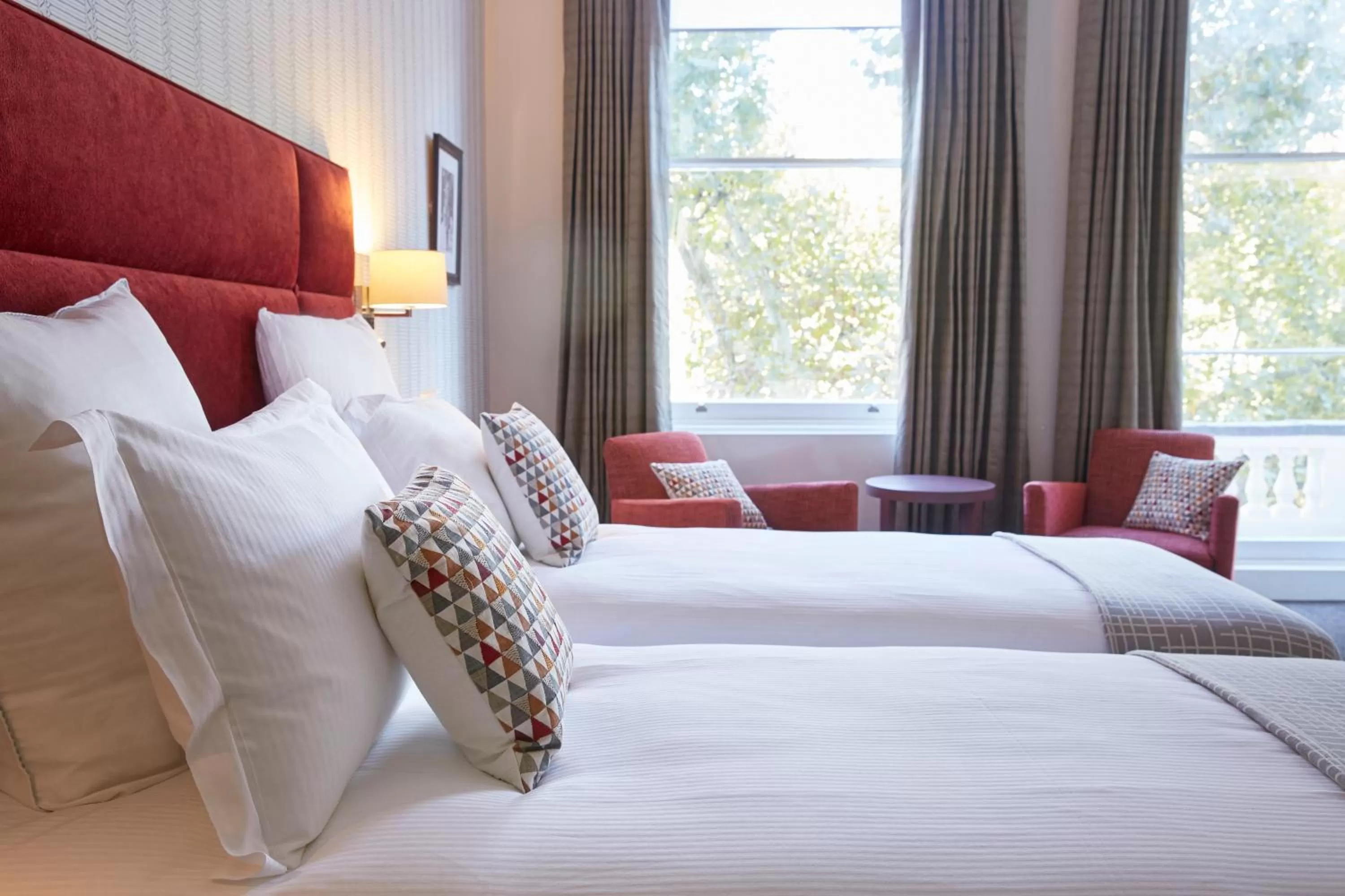 Bed in 54 Queen's Gate Hotel