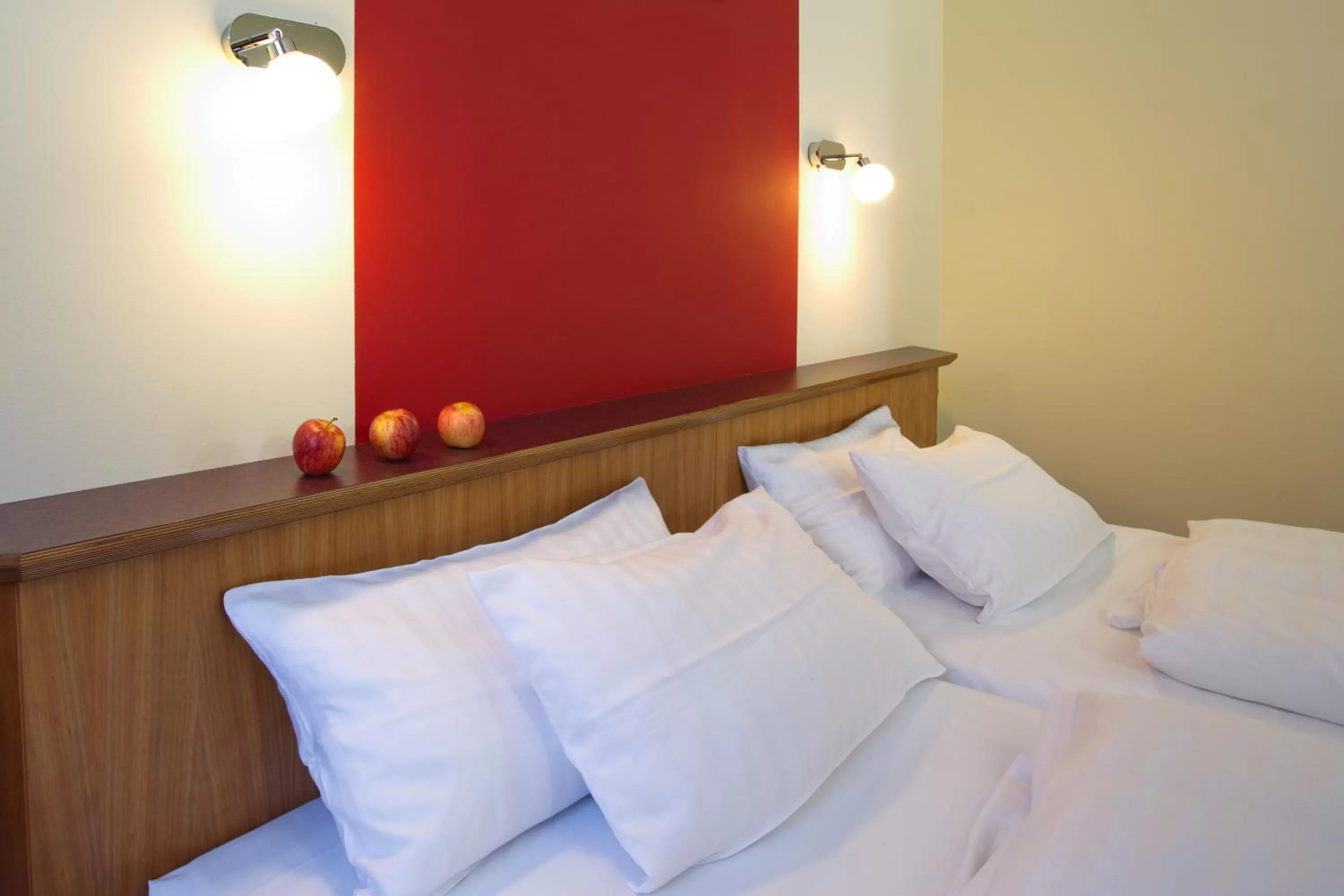 Bed in Hotel Deutsches Haus