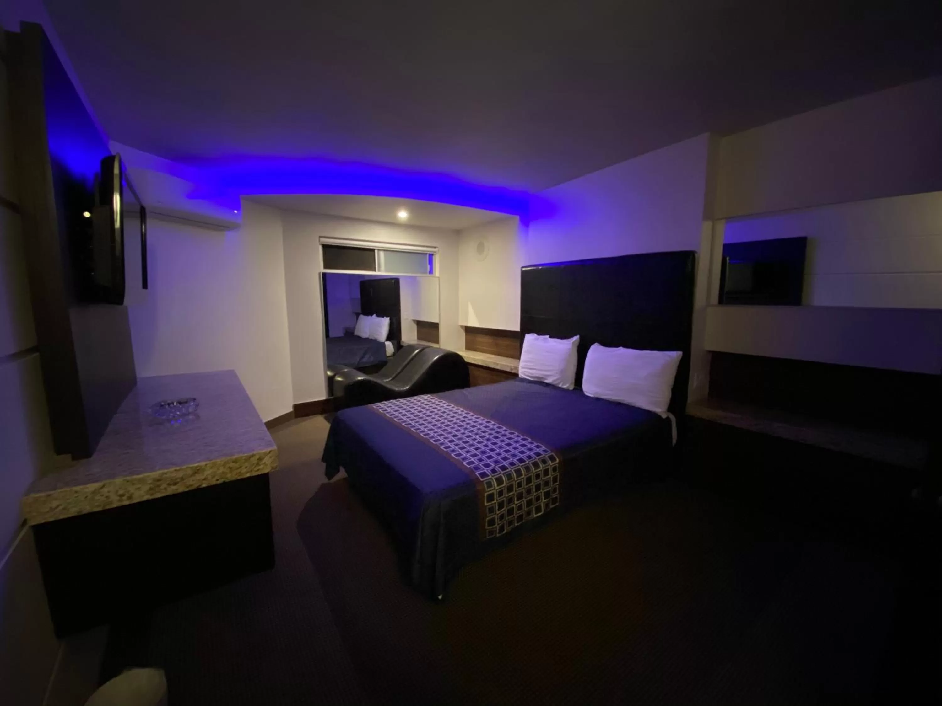 Bed in Motel Encuentro