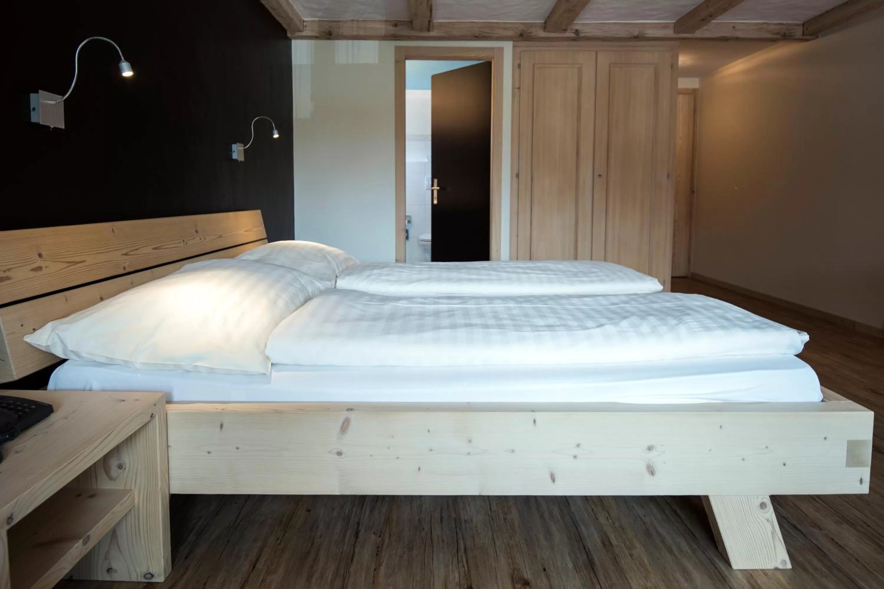 Bed in Hotel Alphorn