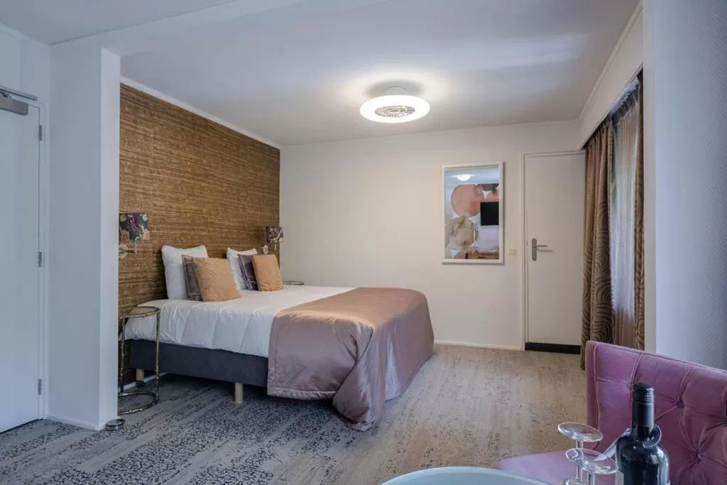 Bed in Boutique Hotel Slenaker Vallei - Buitengewoongenieten