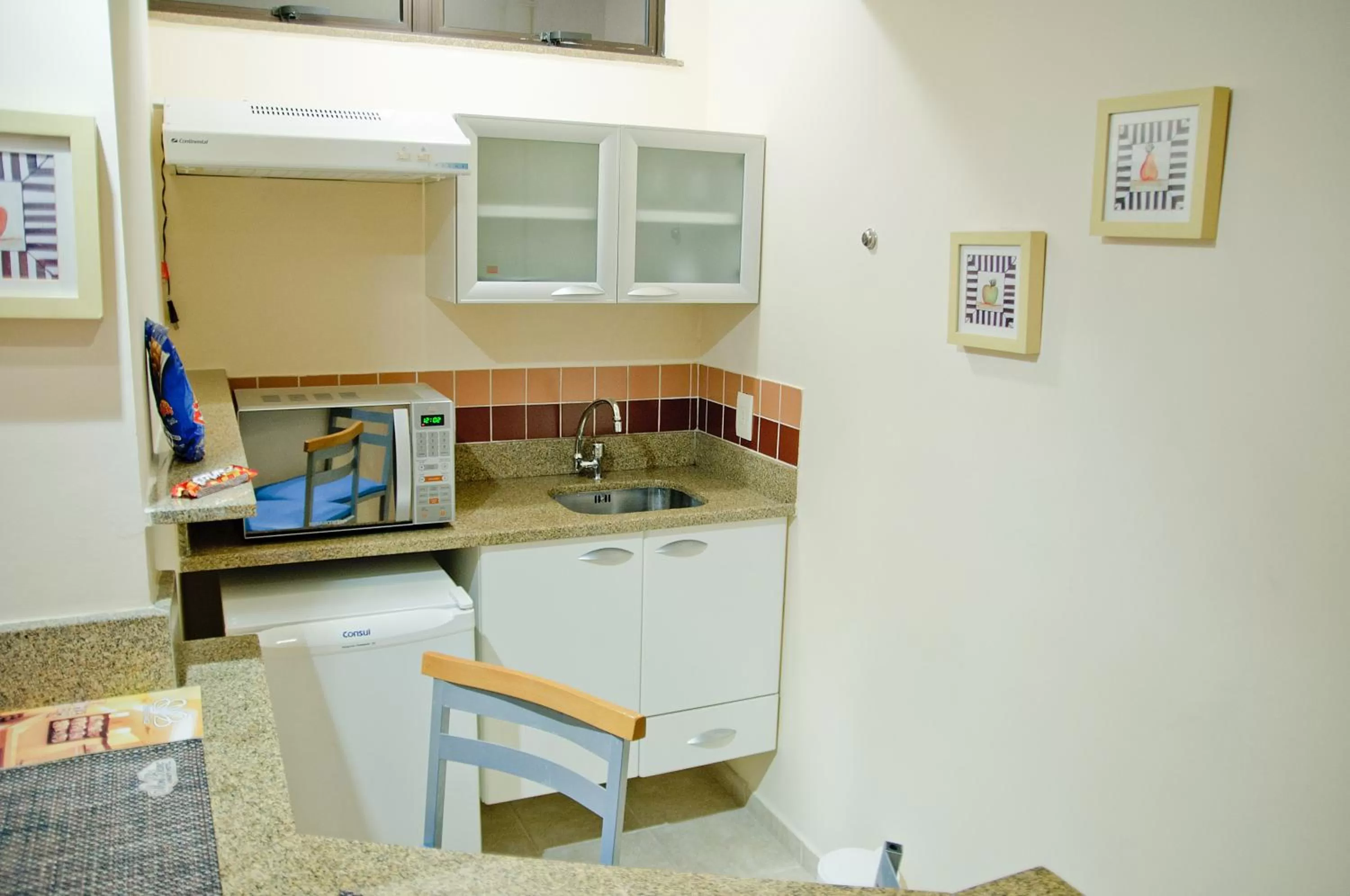 Kitchen or kitchenette in Mont Blanc Apart Hotel Nova Iguaçu