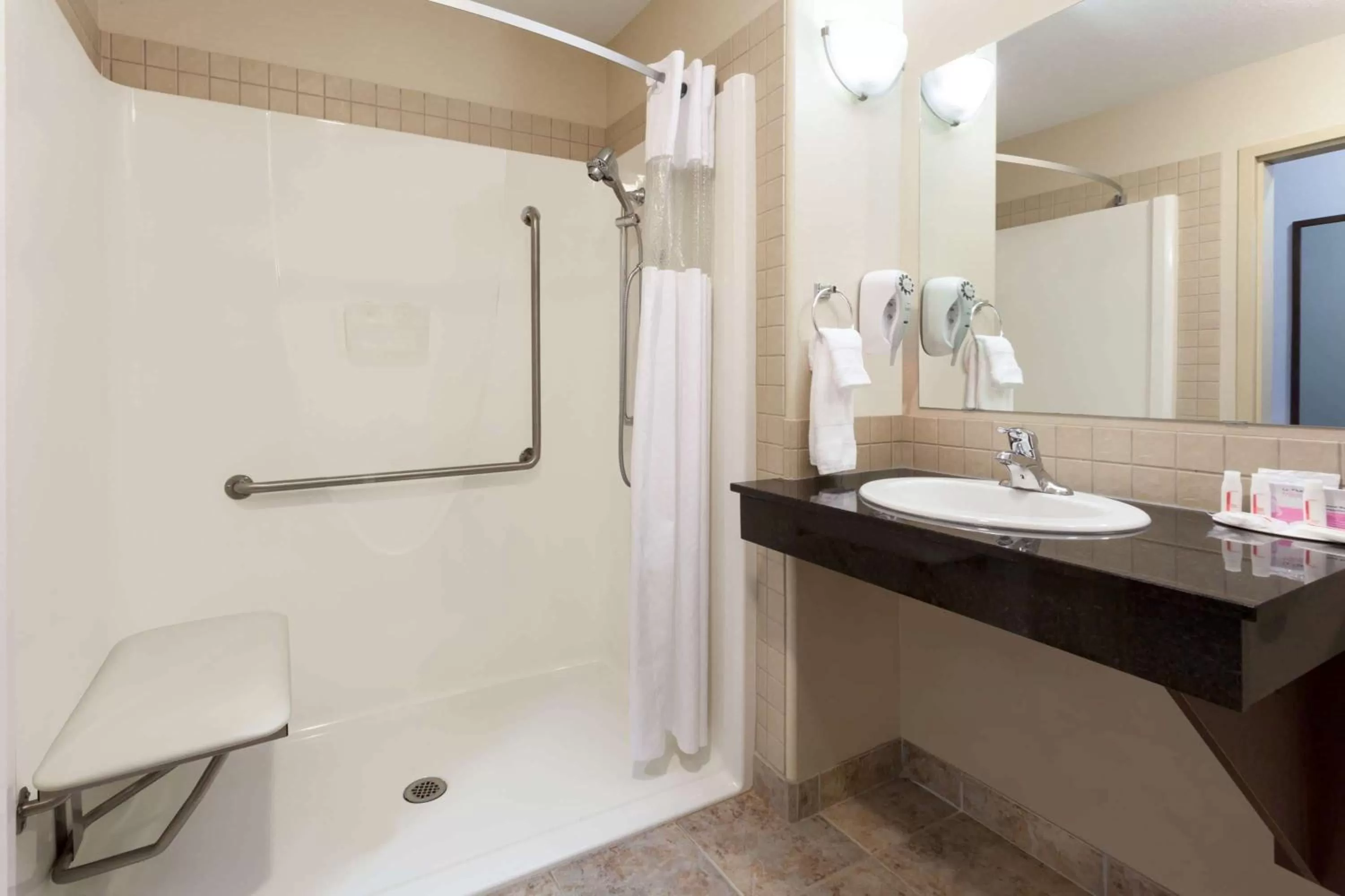 Shower in Ramada by Wyndham Weyburn