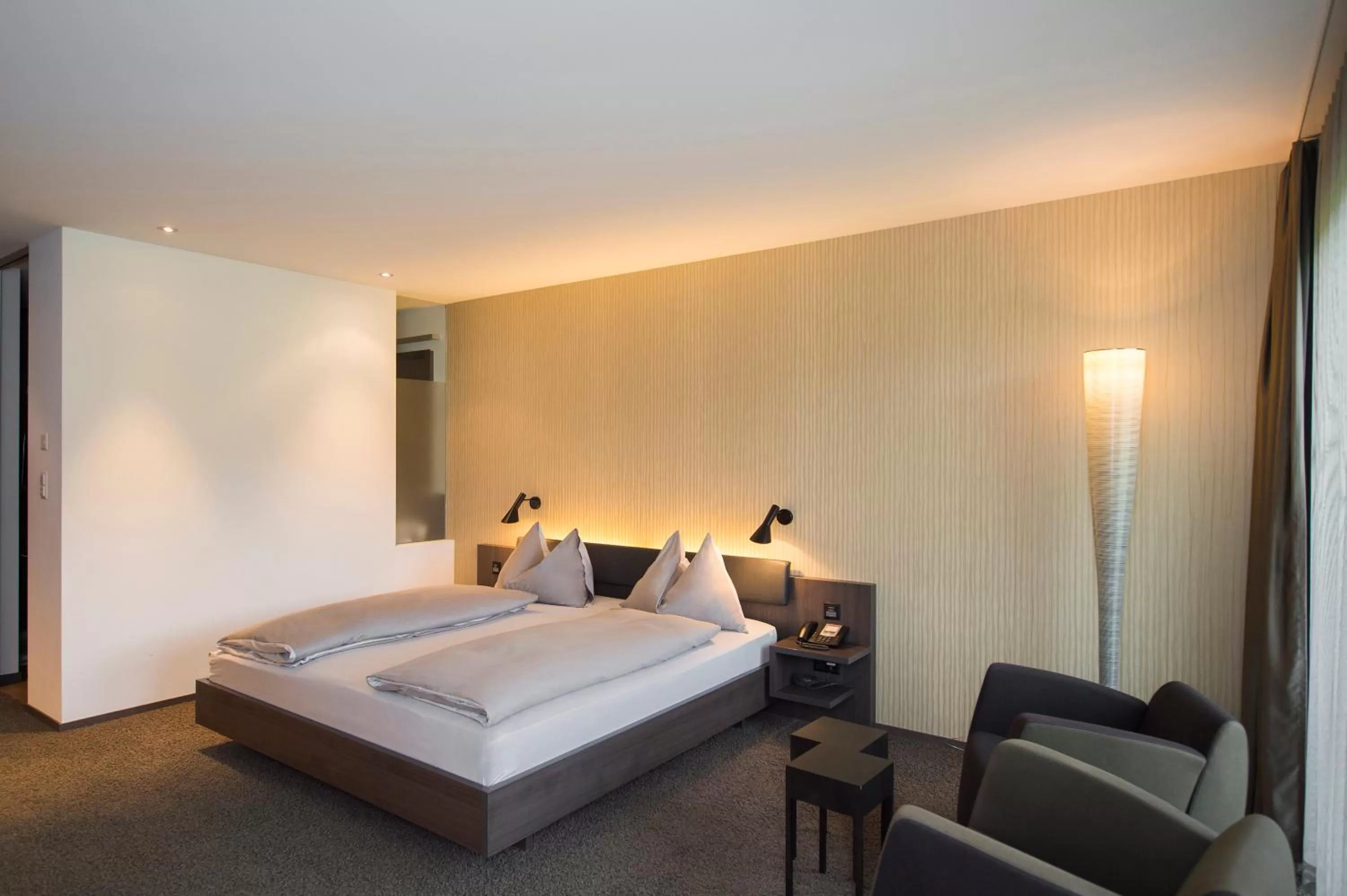 Photo of the whole room, Bed in Wellnesshotel Golfpanorama